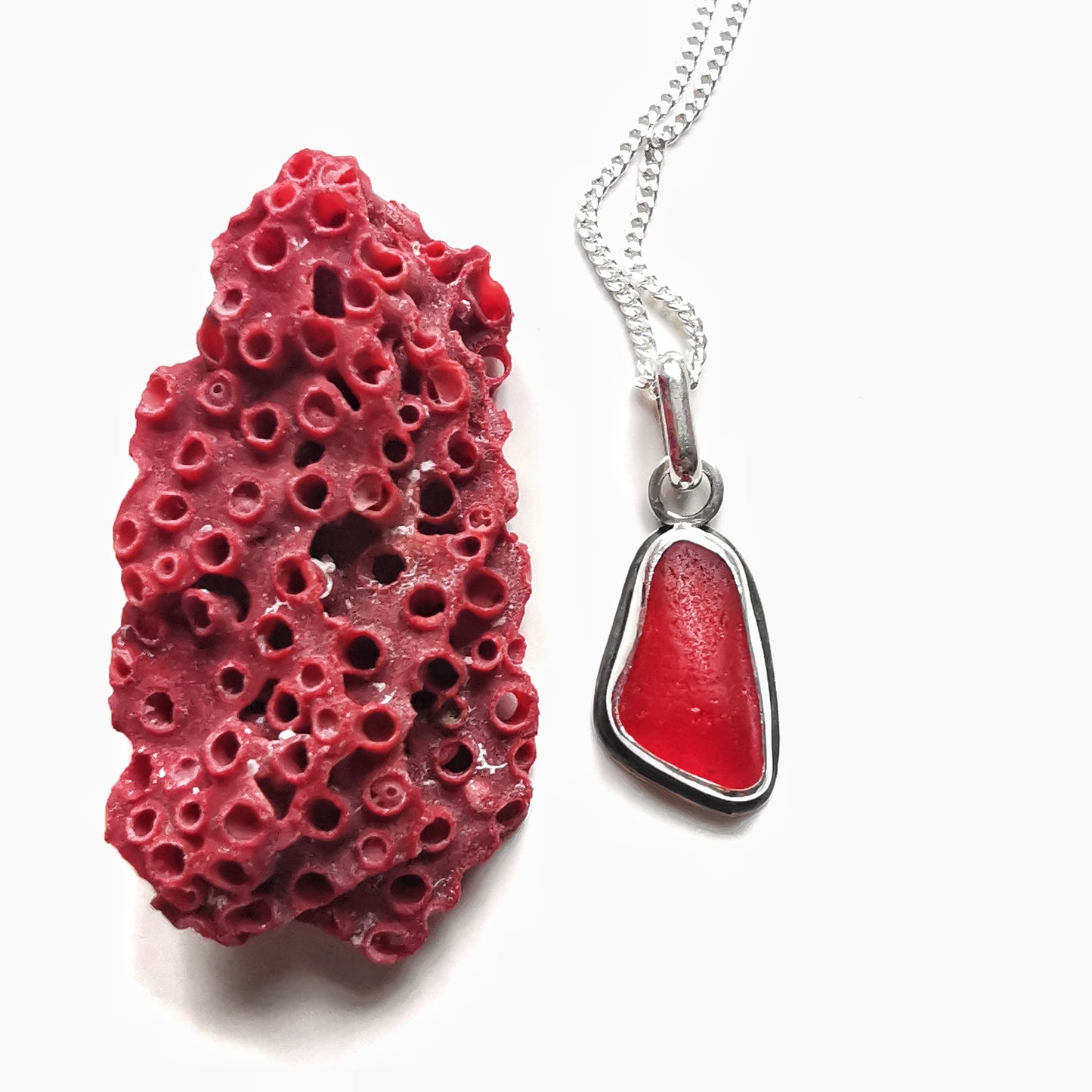 Scottish red sea glass & sterling silver pendant.