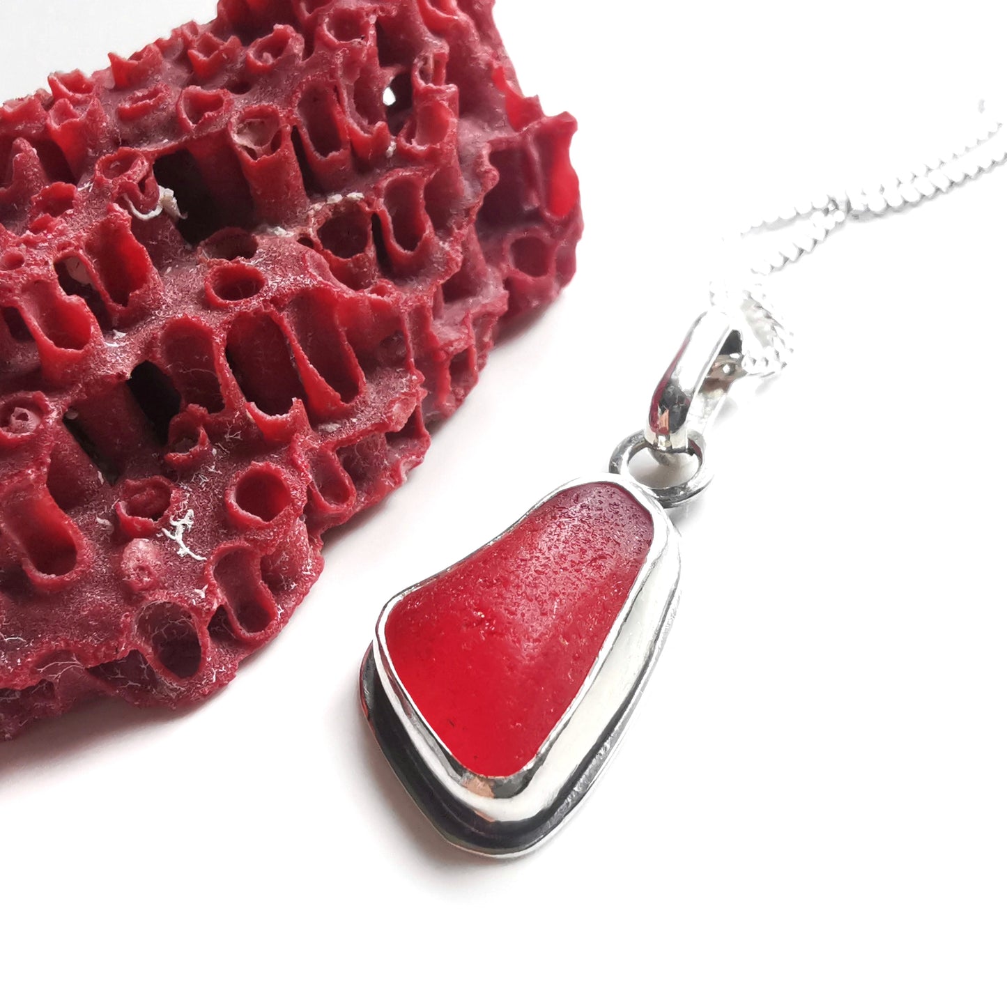 Scottish red sea glass & sterling silver pendant.