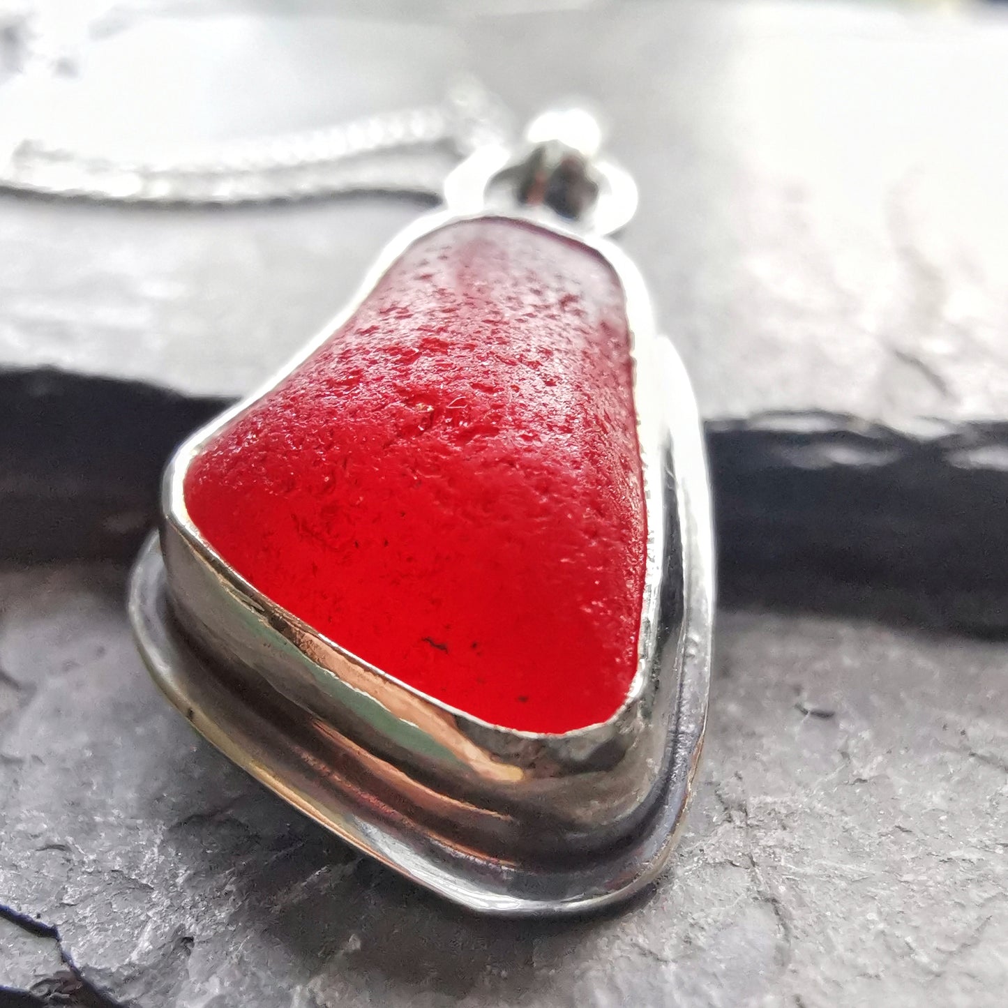 Scottish red sea glass & sterling silver pendant.