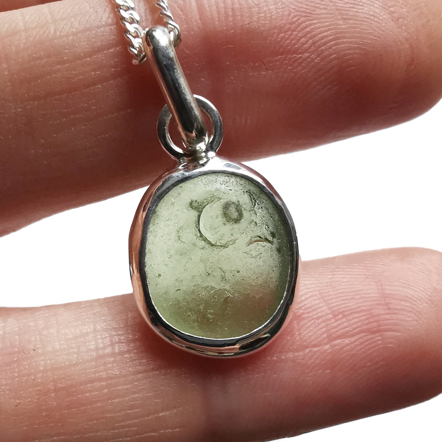 Green sea glass & sterling silver pendant.