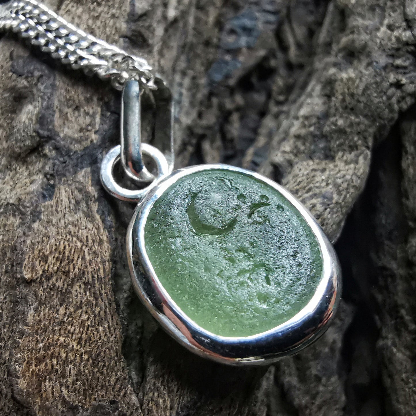 Green sea glass & sterling silver pendant.