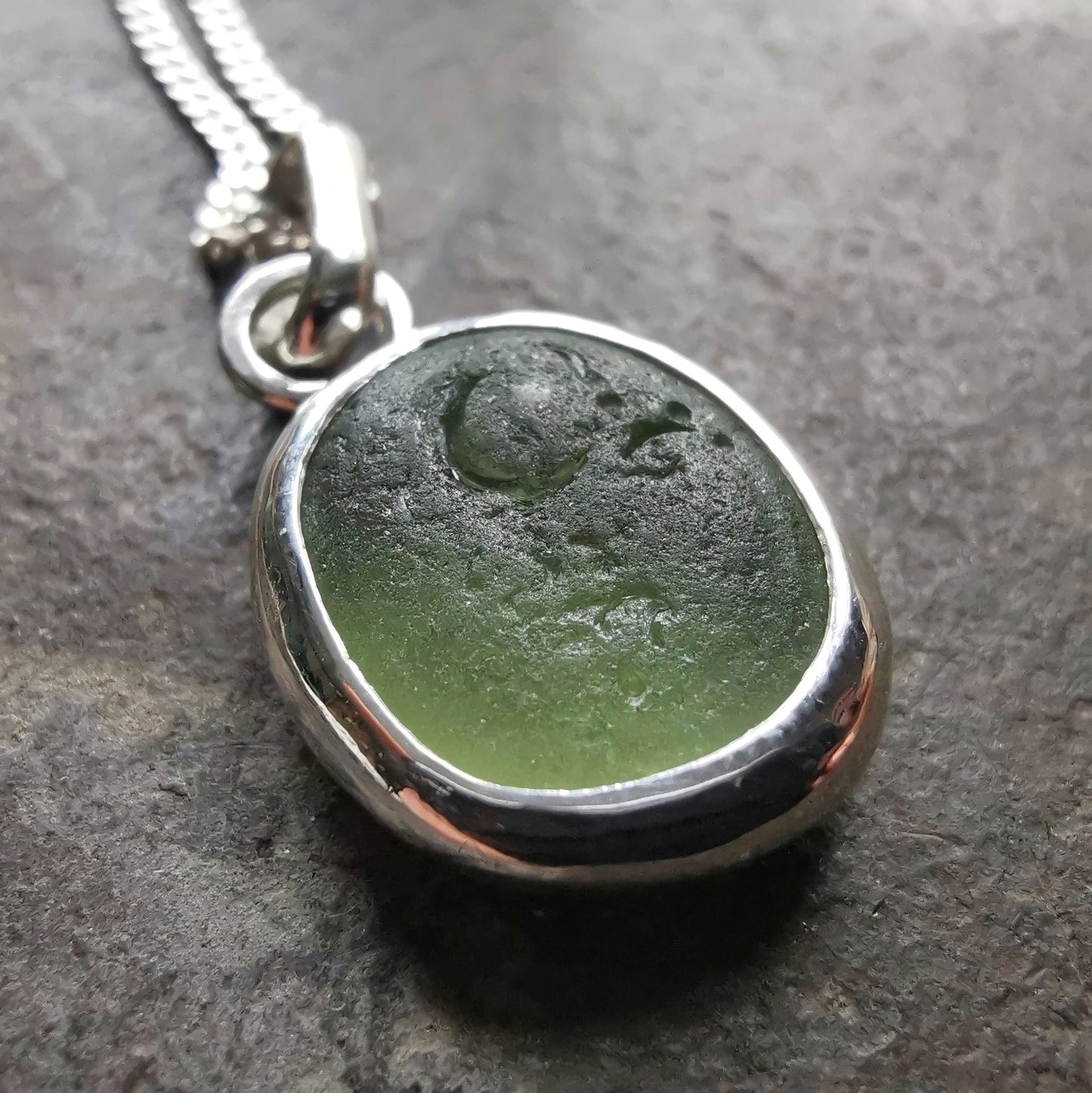 Green sea glass & sterling silver pendant.