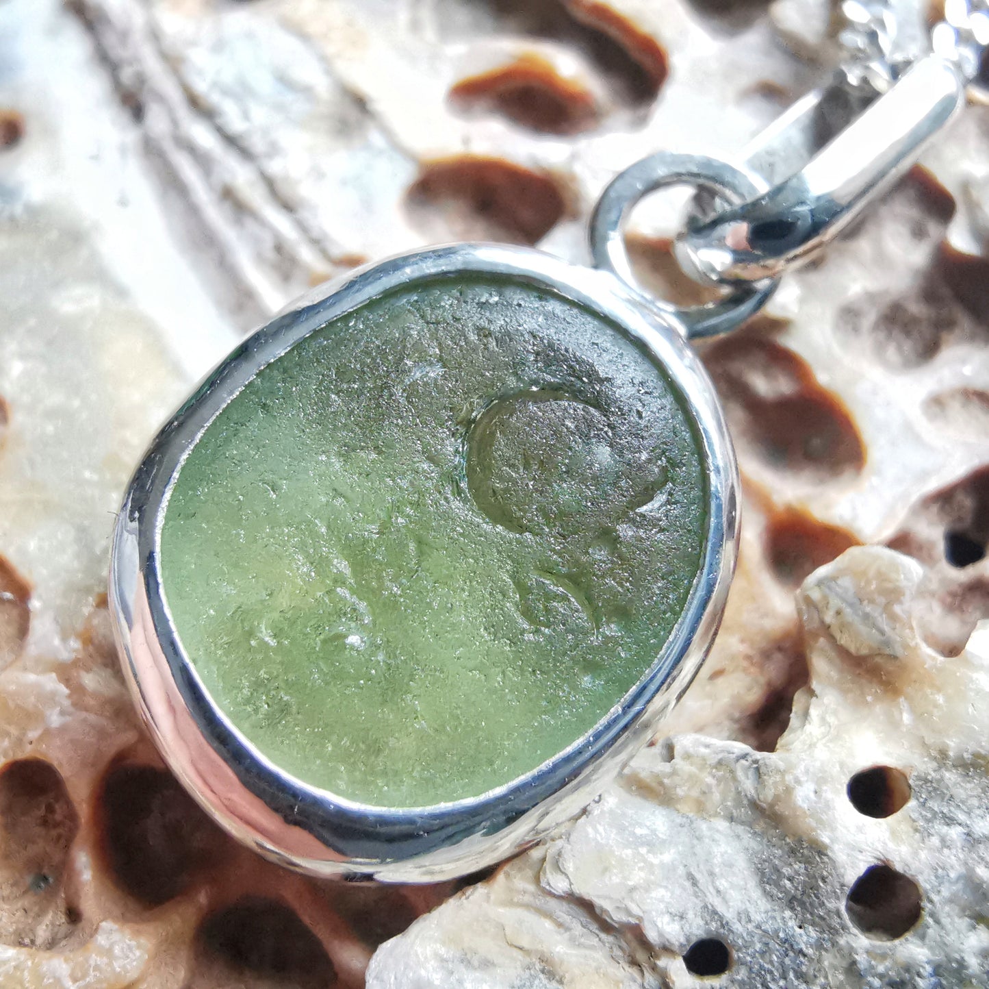 Green sea glass & sterling silver pendant.