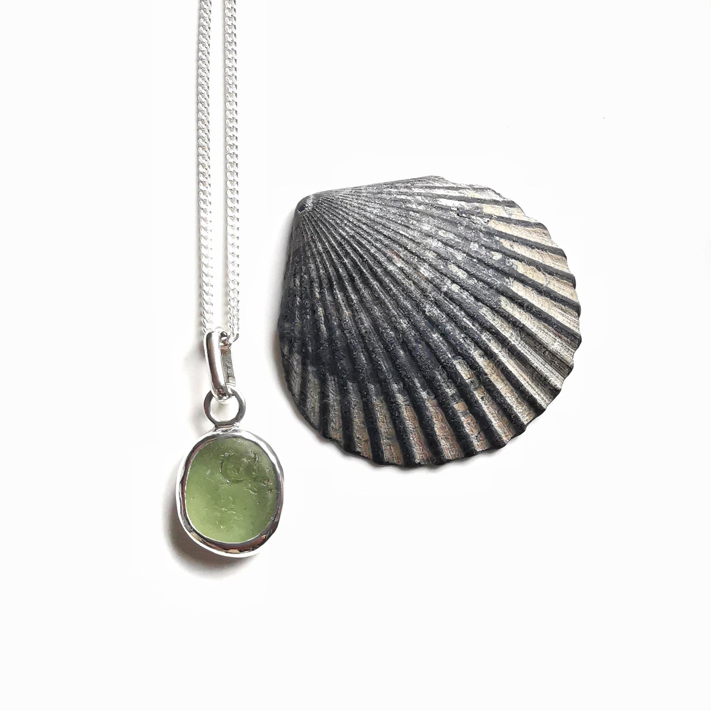 Green sea glass & sterling silver pendant.