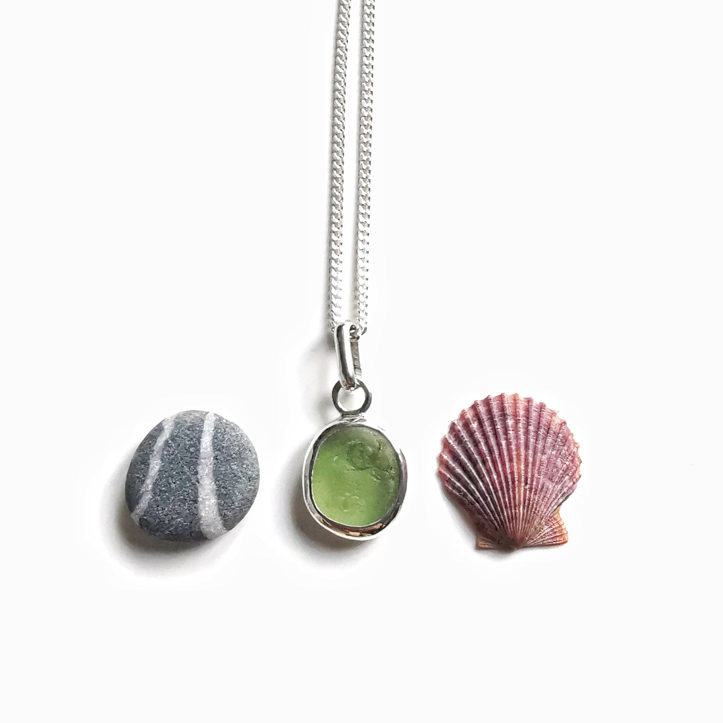 Green sea glass & sterling silver pendant.