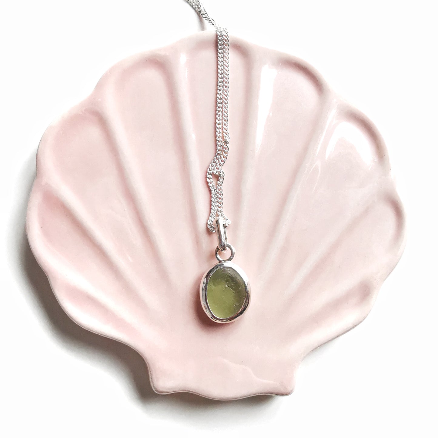 Green sea glass & sterling silver pendant.