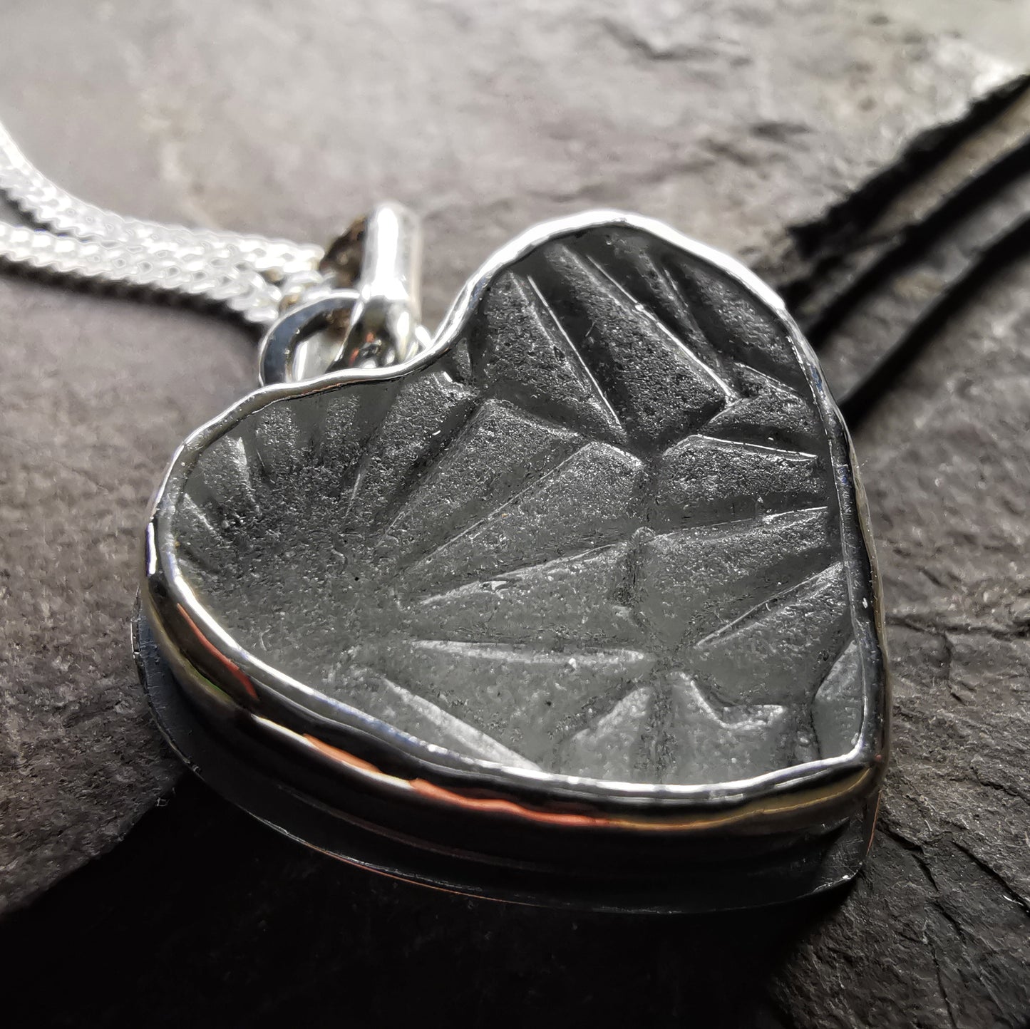 Clear sea glass heart & sterling silver pendant.