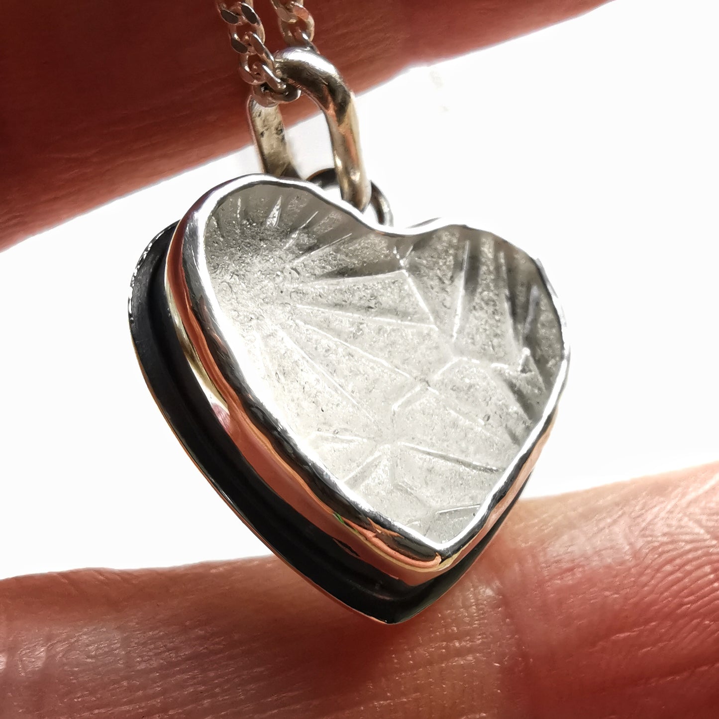 Clear sea glass heart & sterling silver pendant.