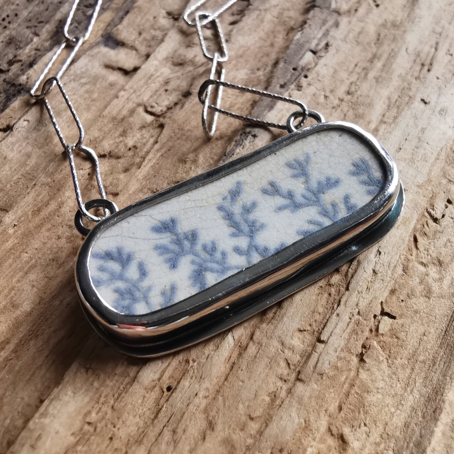 Scottish seaweed pattern sea pottery & sterling silver pendant.