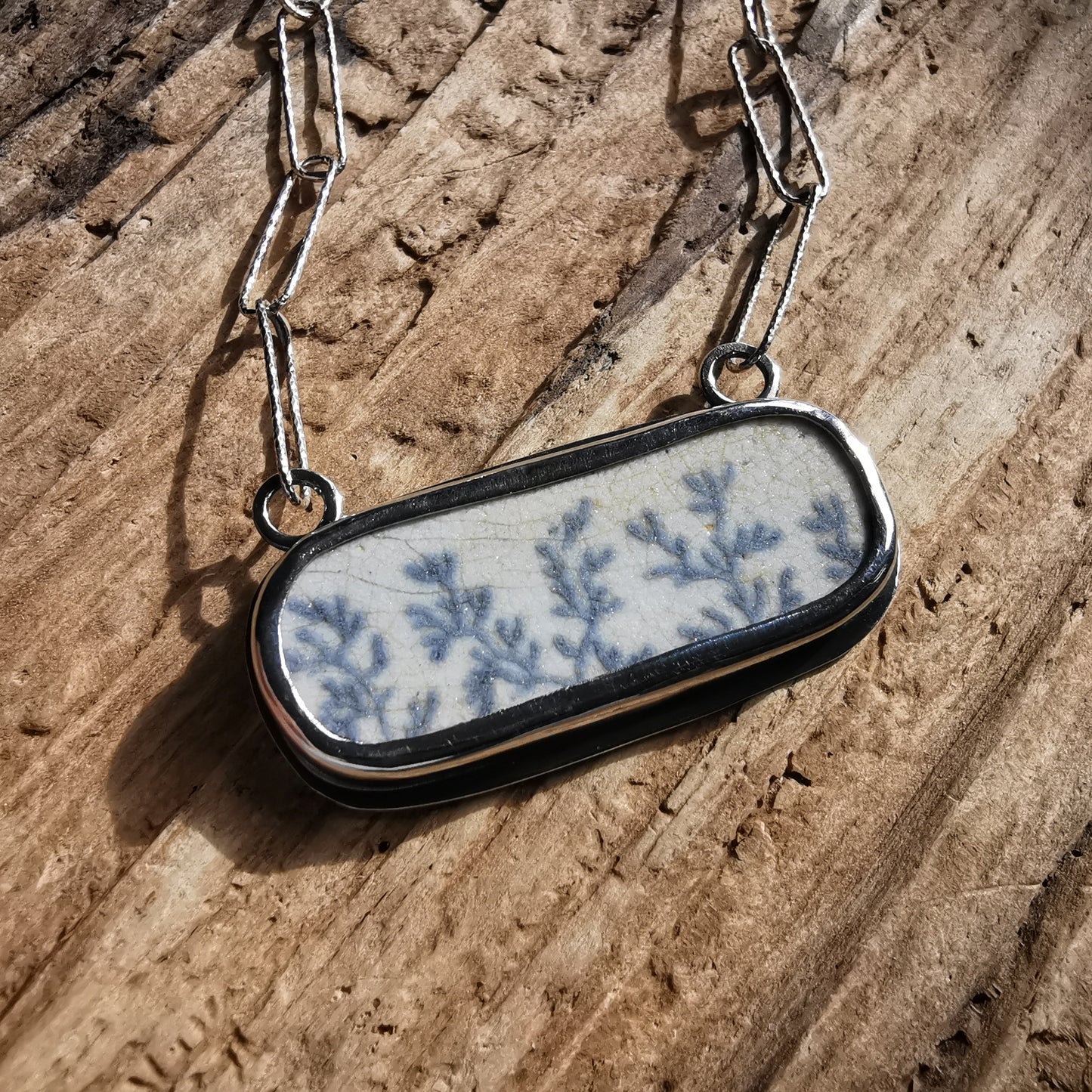 Scottish seaweed pattern sea pottery & sterling silver pendant.