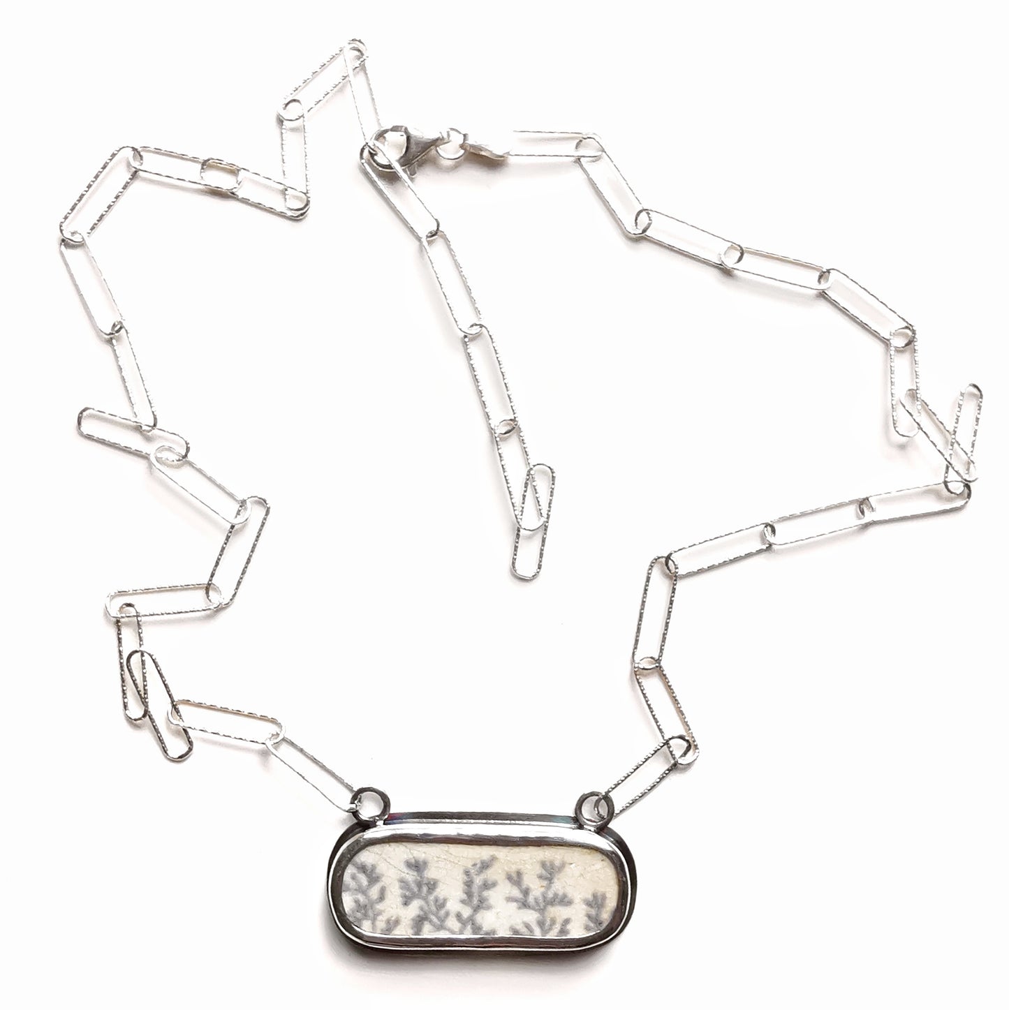 Scottish seaweed pattern sea pottery & sterling silver pendant.