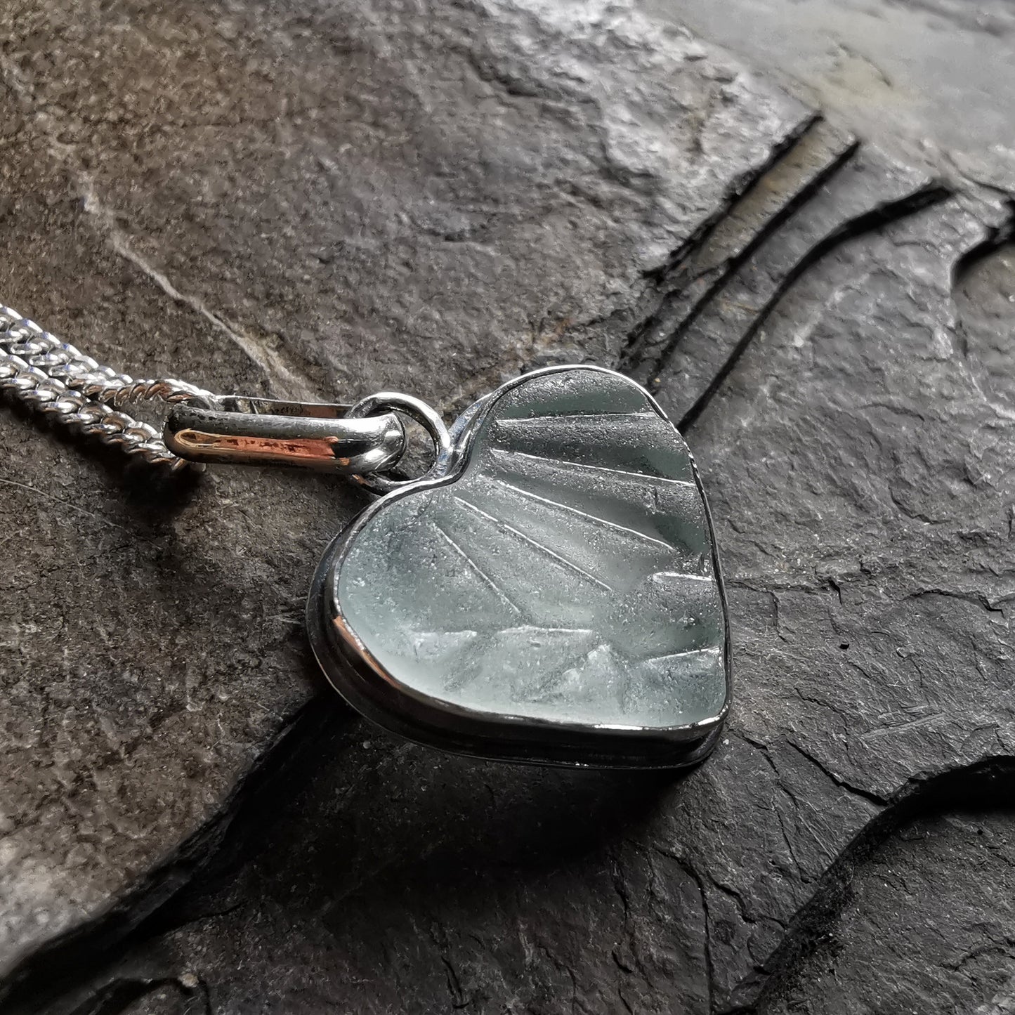 Clear sea glass heart & sterling silver pendant.