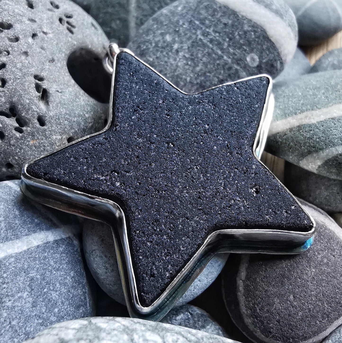 Scottish black sea glass star & sterling silver pendant.