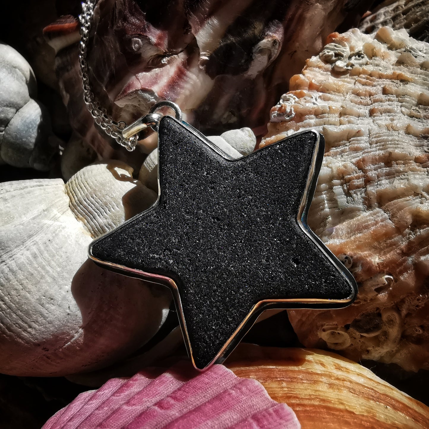 Scottish black sea glass star & sterling silver pendant.