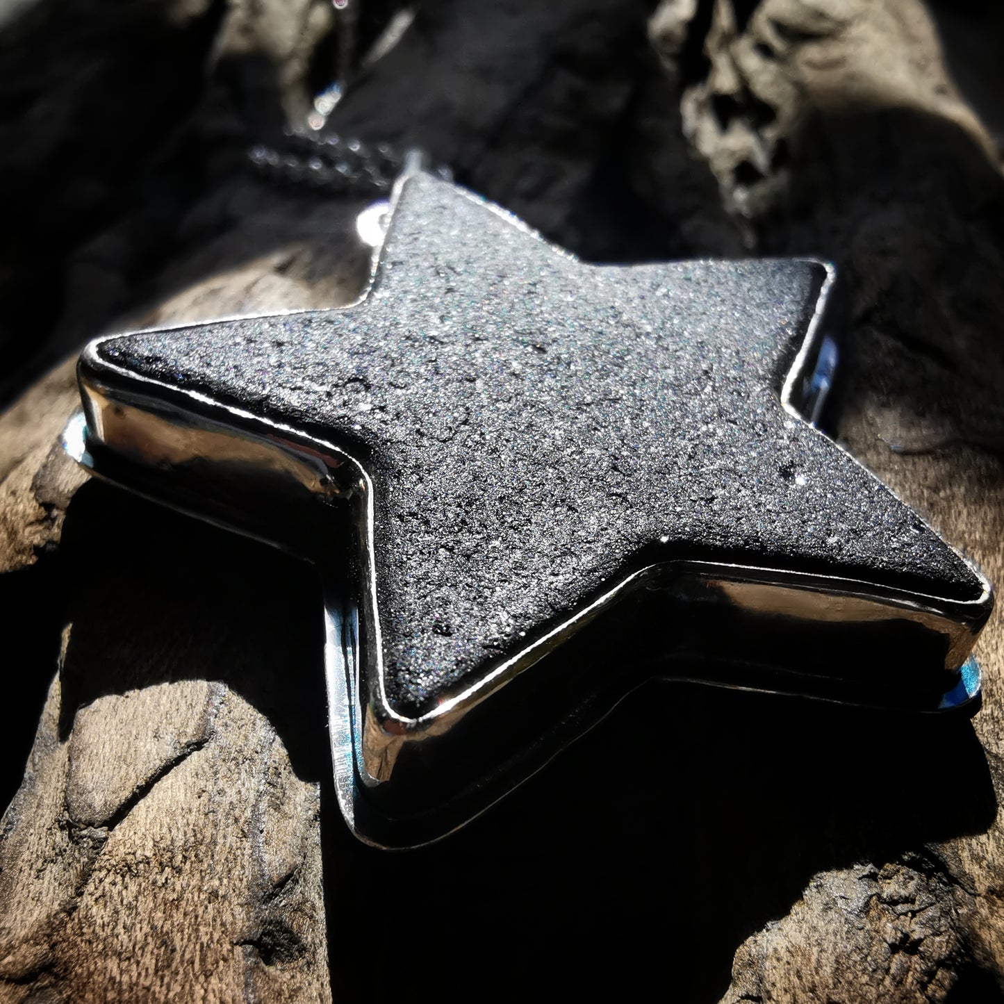 Scottish black sea glass star & sterling silver pendant.