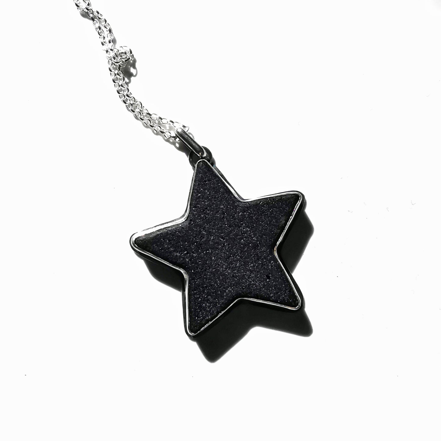 Scottish black sea glass star & sterling silver pendant.