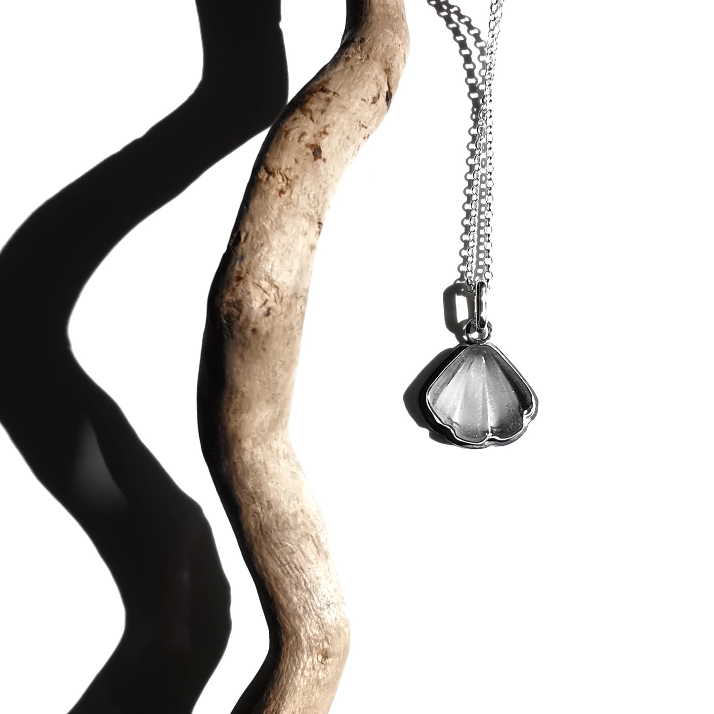 Reserved for Kerry. Scottish clear sea glass shell & sterling silver pendant.
