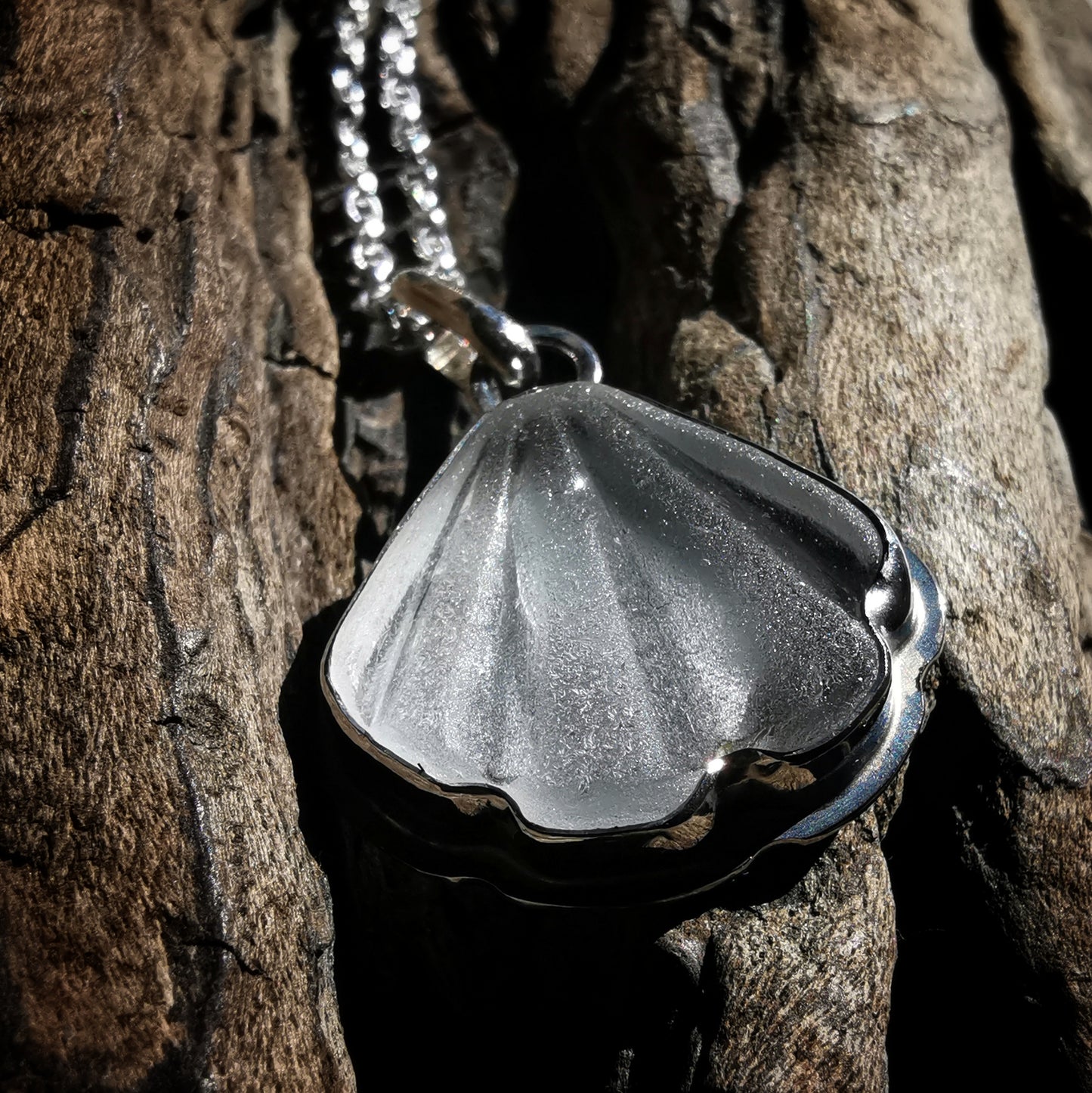 Reserved for Kerry. Scottish clear sea glass shell & sterling silver pendant.