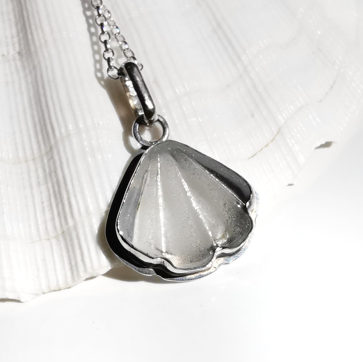 Reserved for Kerry. Scottish clear sea glass shell & sterling silver pendant.