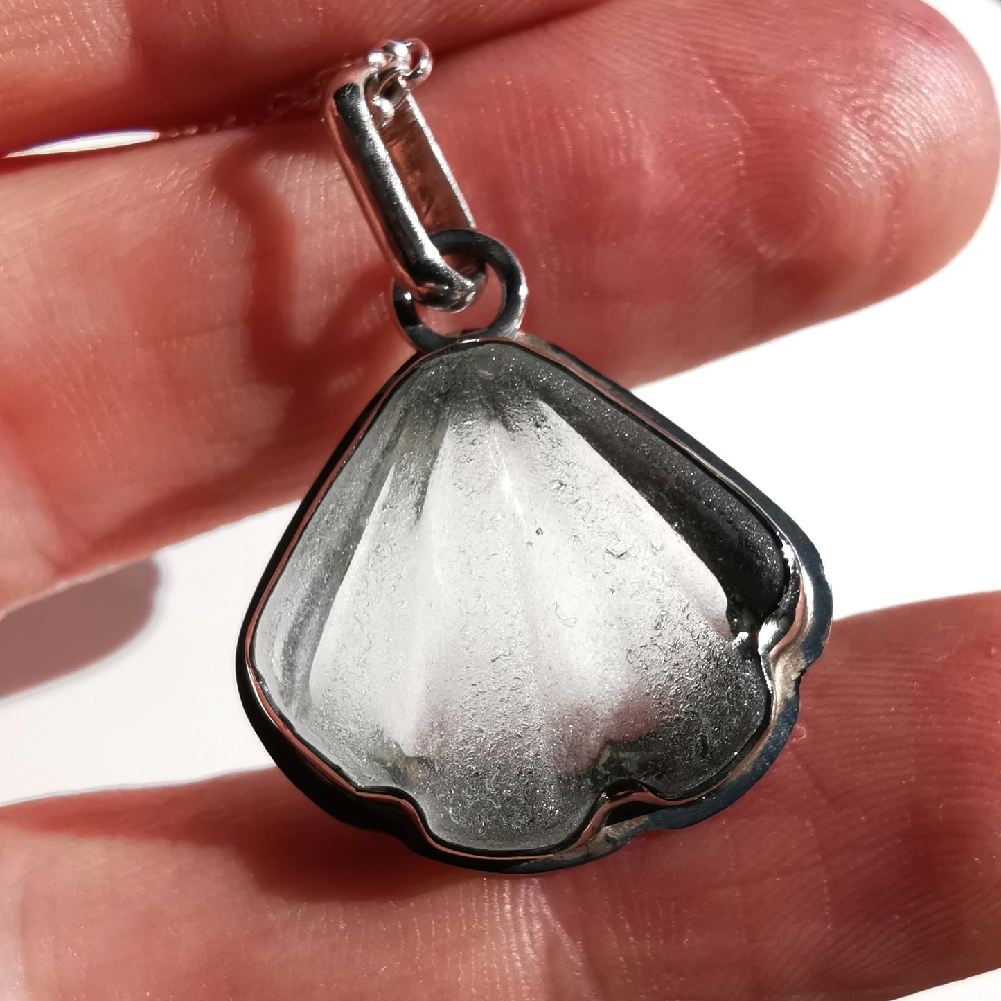 Reserved for Kerry. Scottish clear sea glass shell & sterling silver pendant.