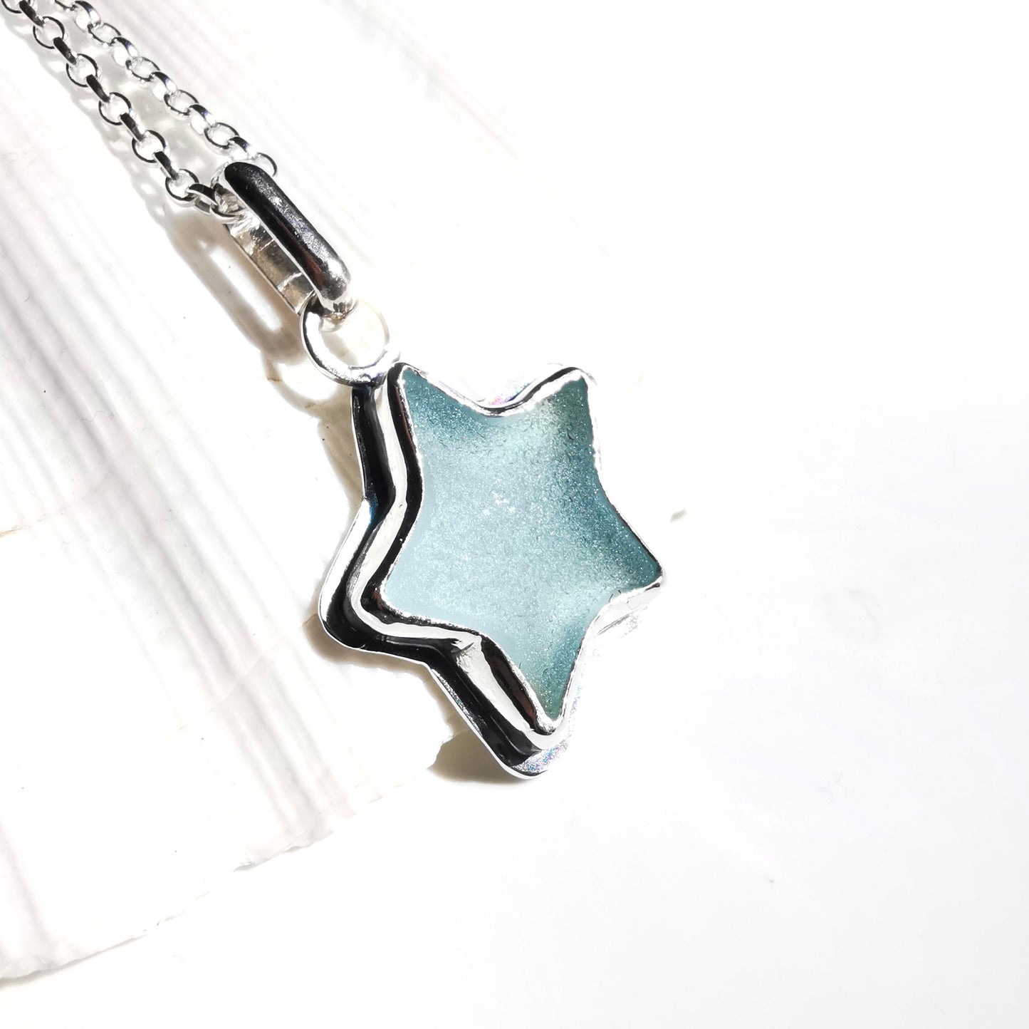 Reserved for Lesley. Scottish blue sea glass star & sterling silver pendant.