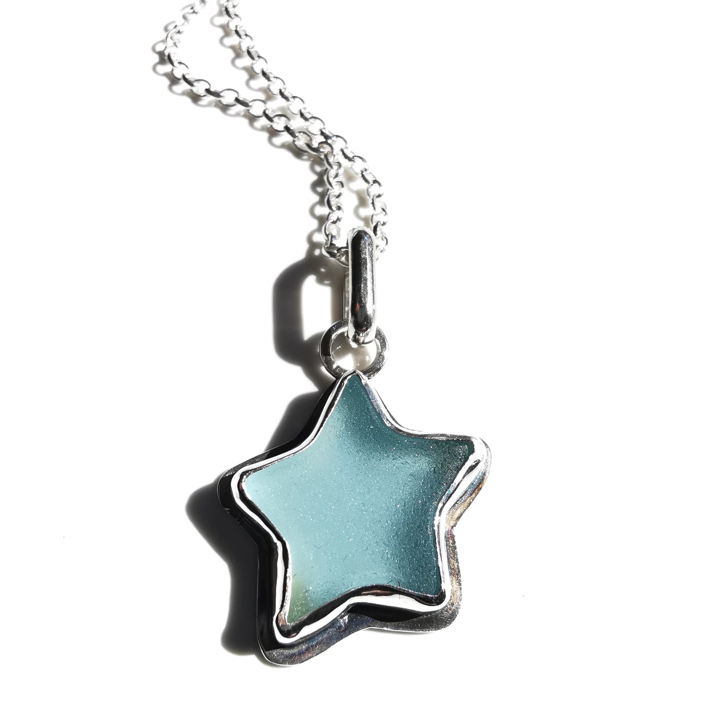Reserved for Lesley. Scottish blue sea glass star & sterling silver pendant.
