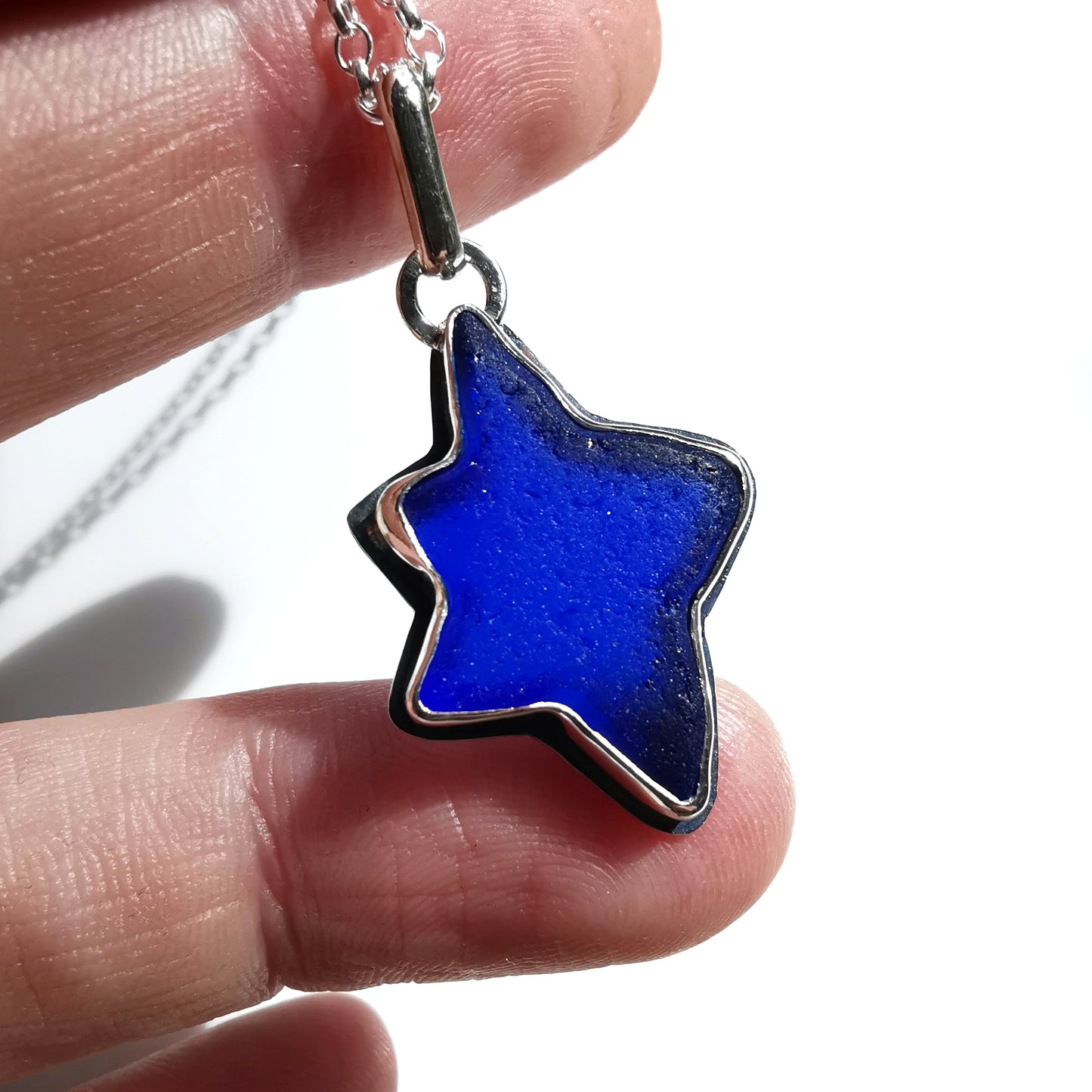 Scottish cobalt blue sea glass star & sterling silver pendant.