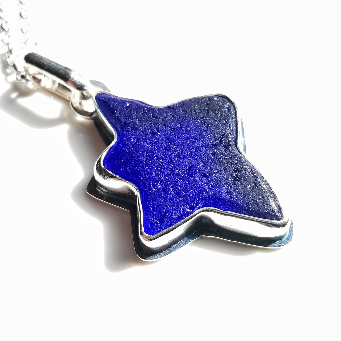 Scottish cobalt blue sea glass star & sterling silver pendant.