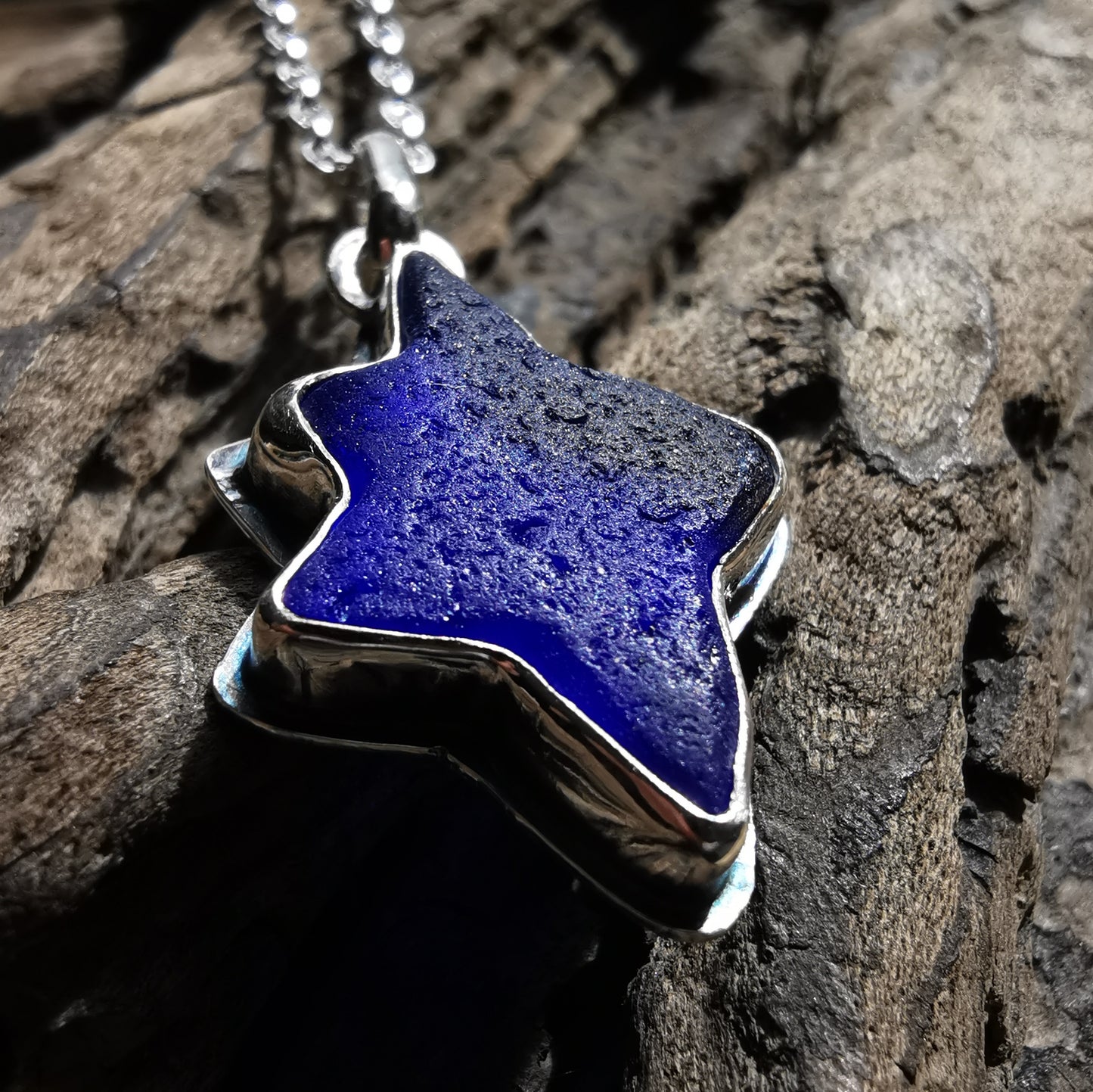 Scottish cobalt blue sea glass star & sterling silver pendant.
