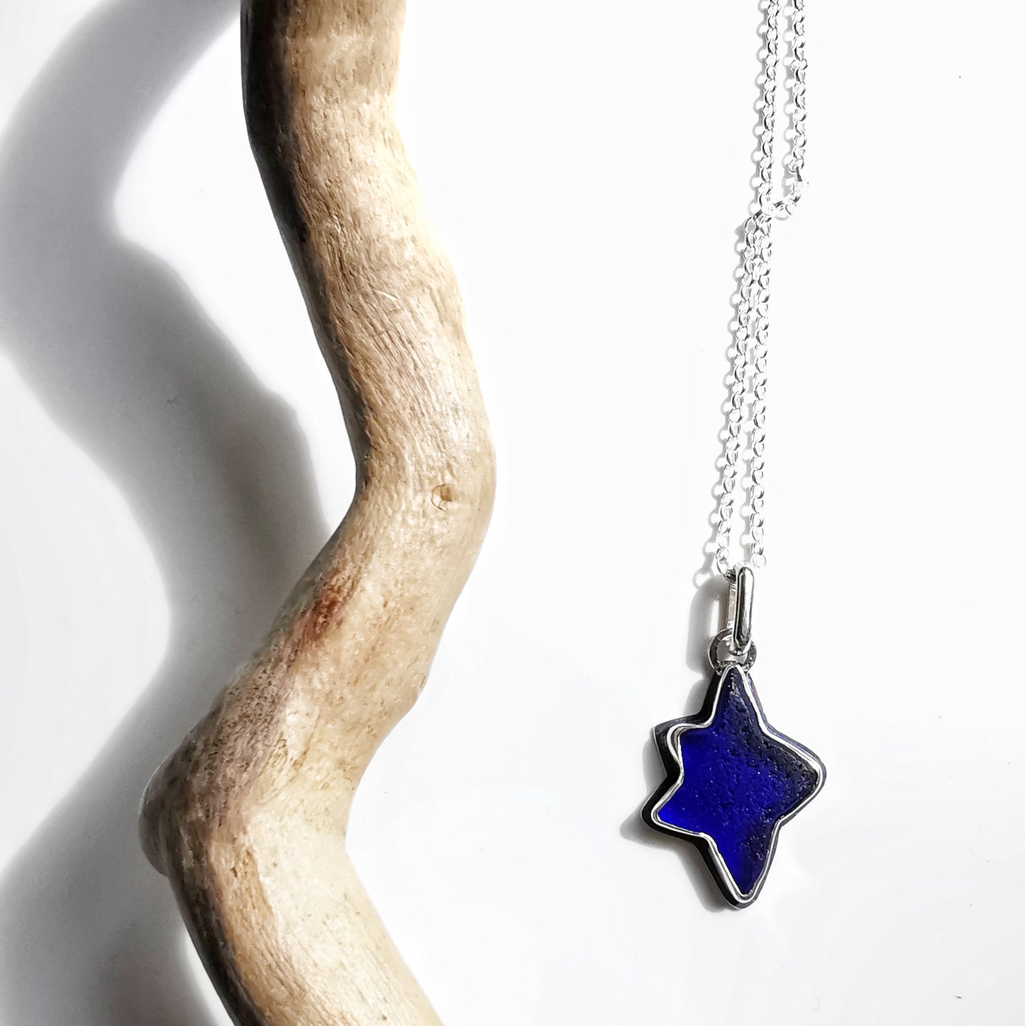 Scottish cobalt blue sea glass star & sterling silver pendant.