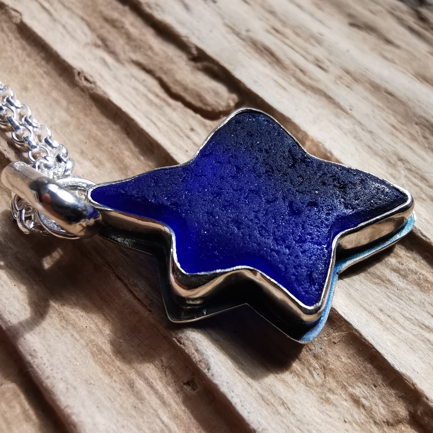 Scottish cobalt blue sea glass star & sterling silver pendant.