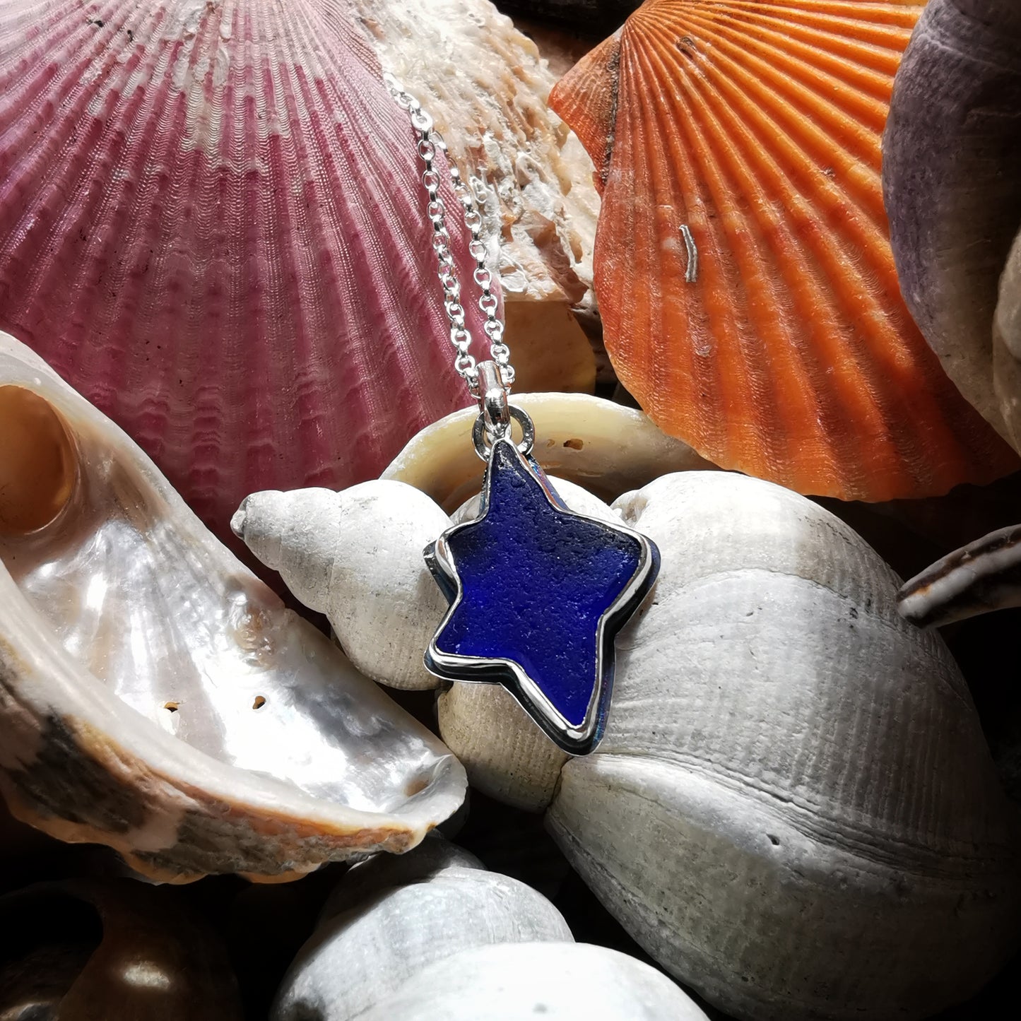Scottish cobalt blue sea glass star & sterling silver pendant.