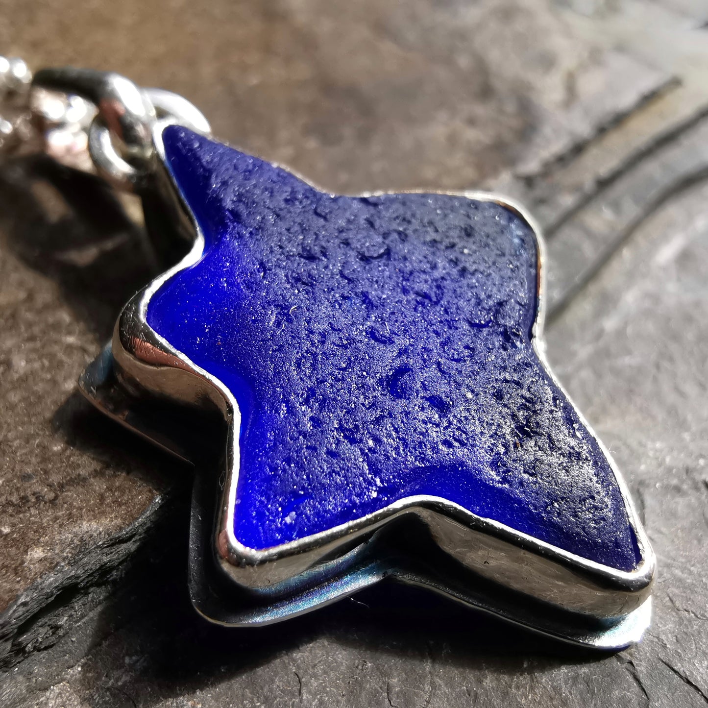 Scottish cobalt blue sea glass star & sterling silver pendant.