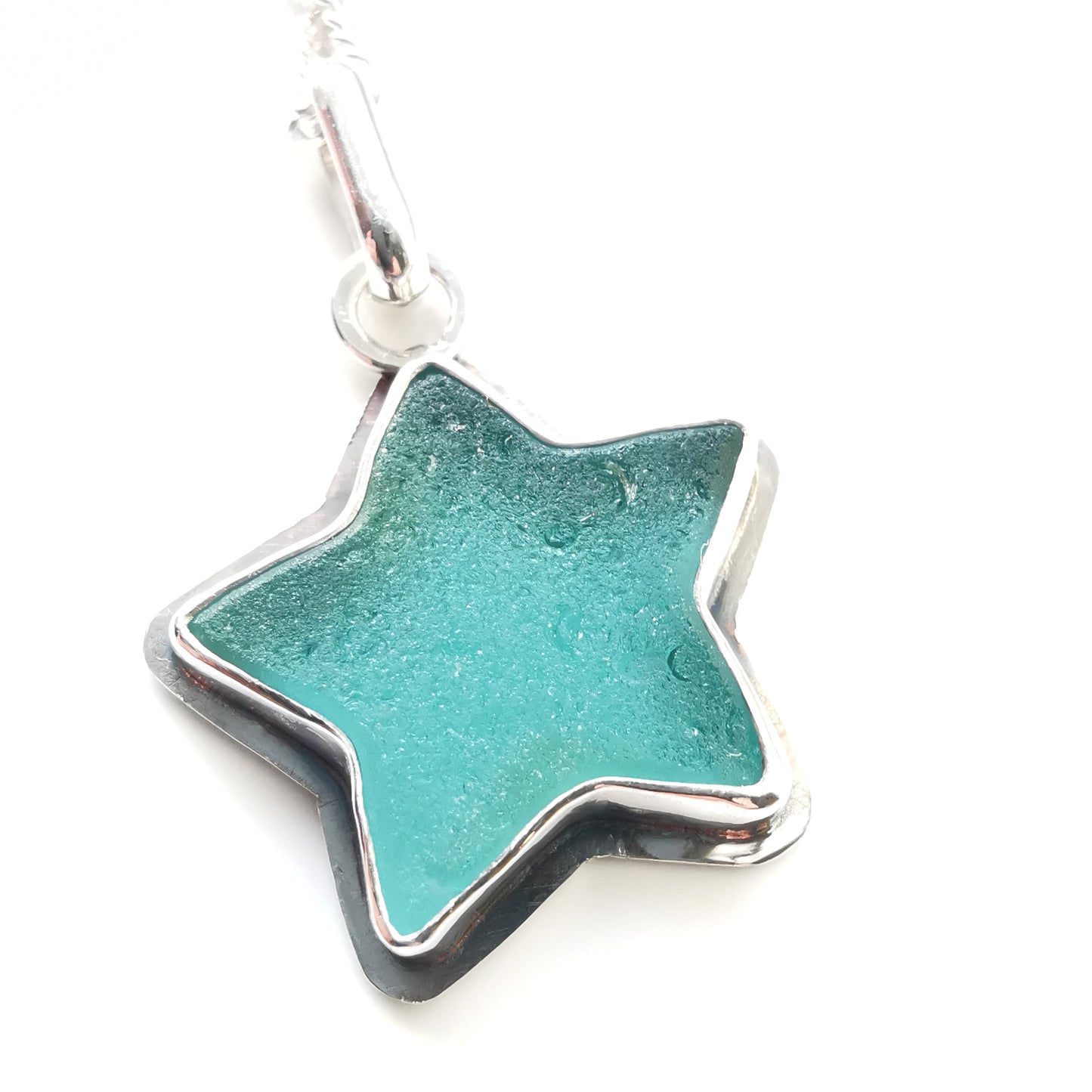Scottish teal sea glass star & sterling silver pendant.