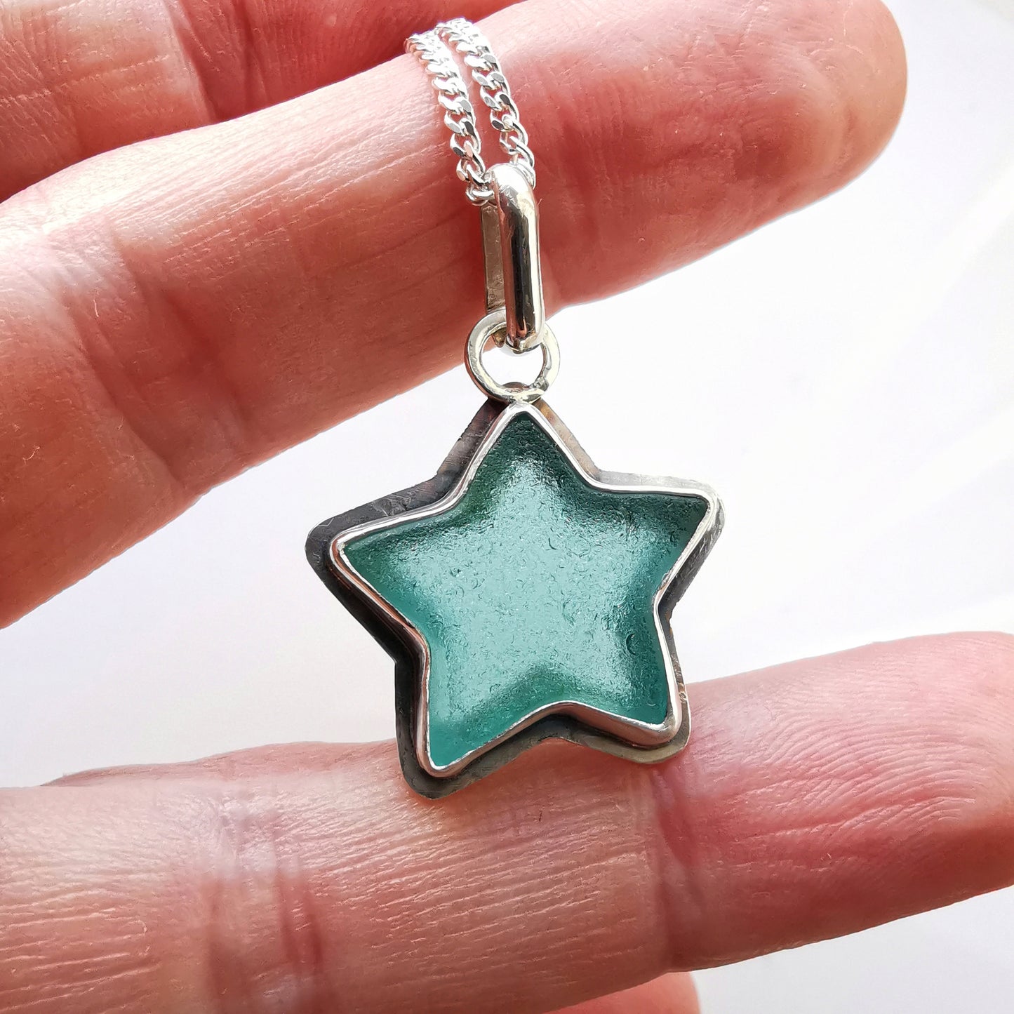 Scottish teal sea glass star & sterling silver pendant.