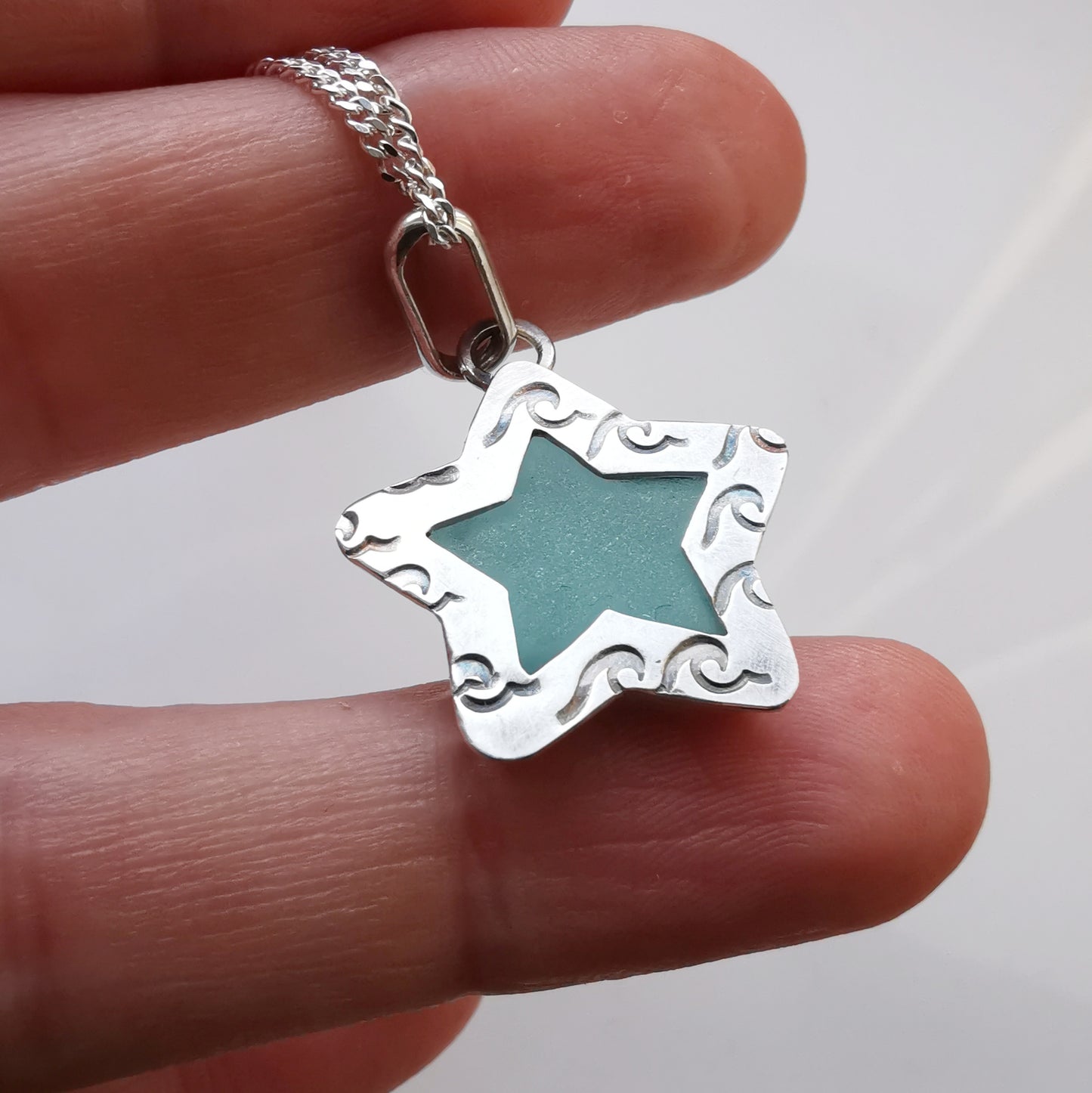 Scottish teal sea glass star & sterling silver pendant.