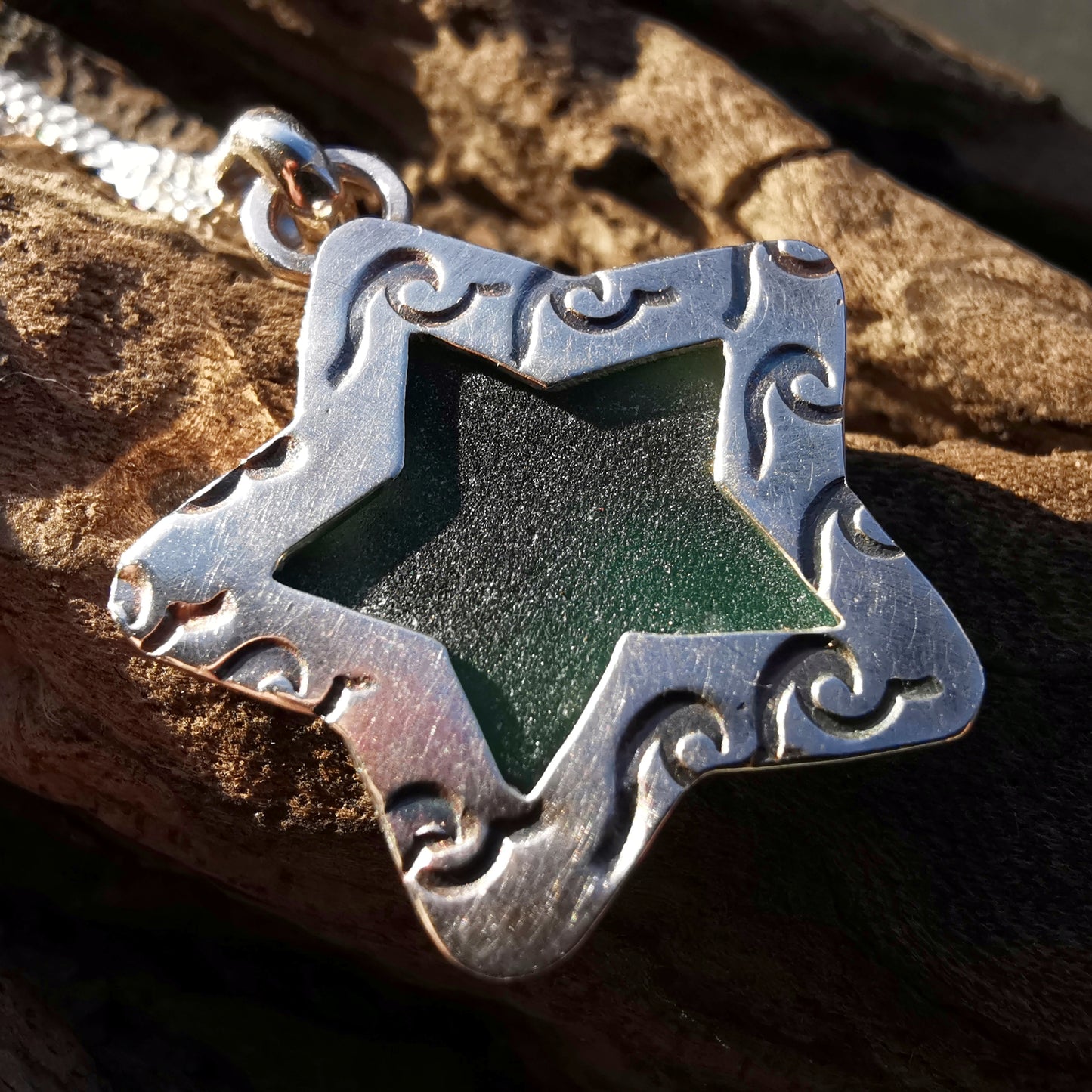 Scottish teal sea glass star & sterling silver pendant.