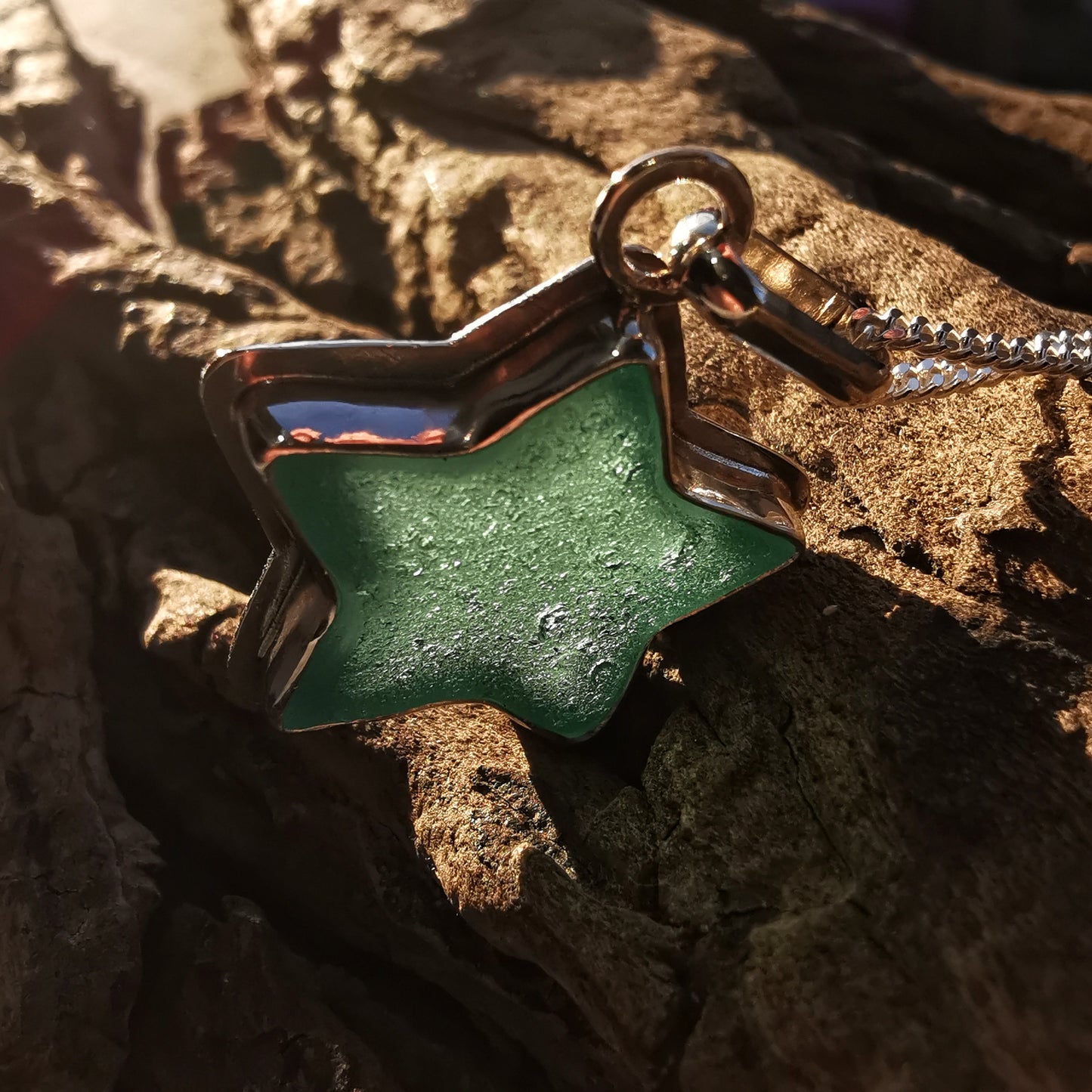 Scottish teal sea glass star & sterling silver pendant.