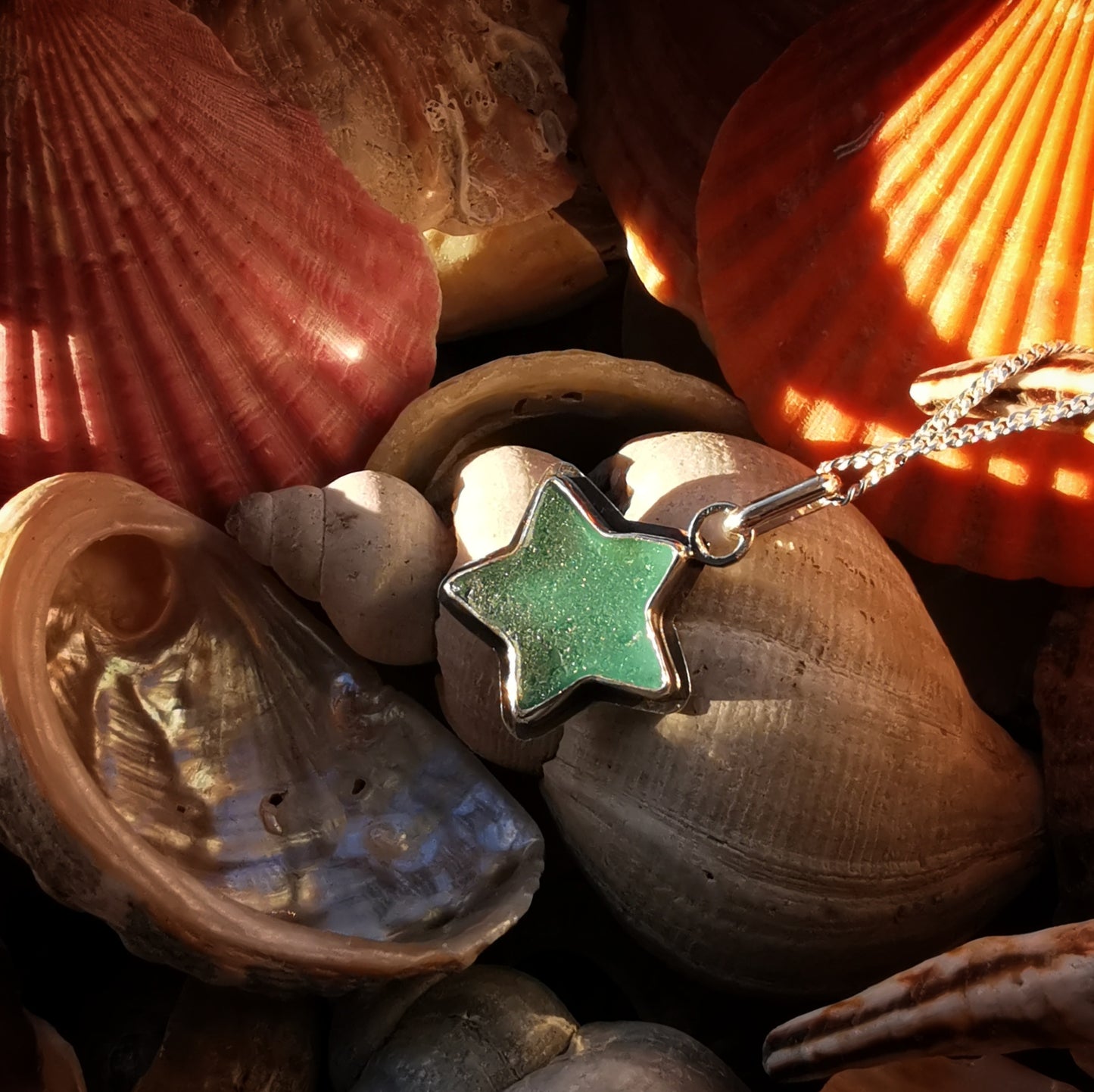 Scottish teal sea glass star & sterling silver pendant.