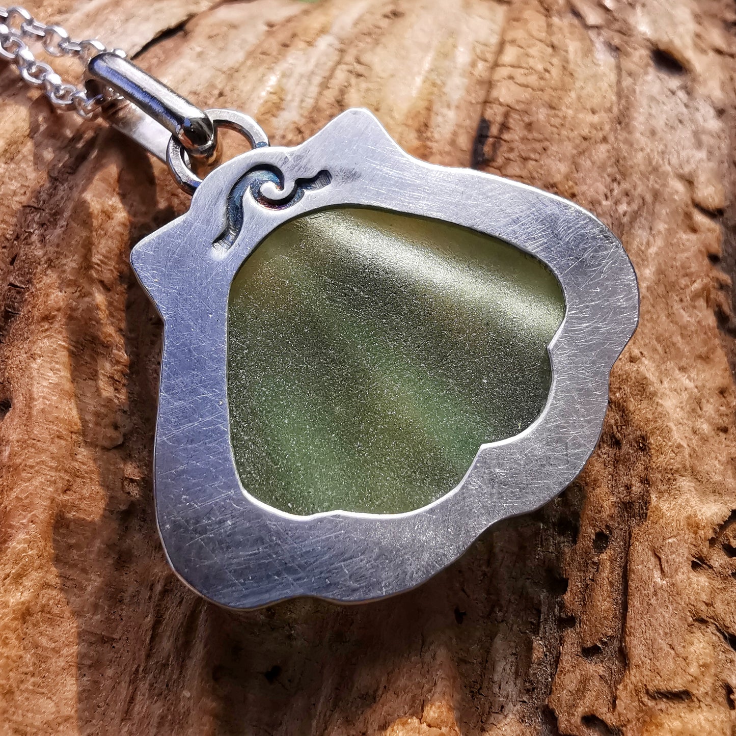 Scottish green sea glass shell & sterling silver pendant.