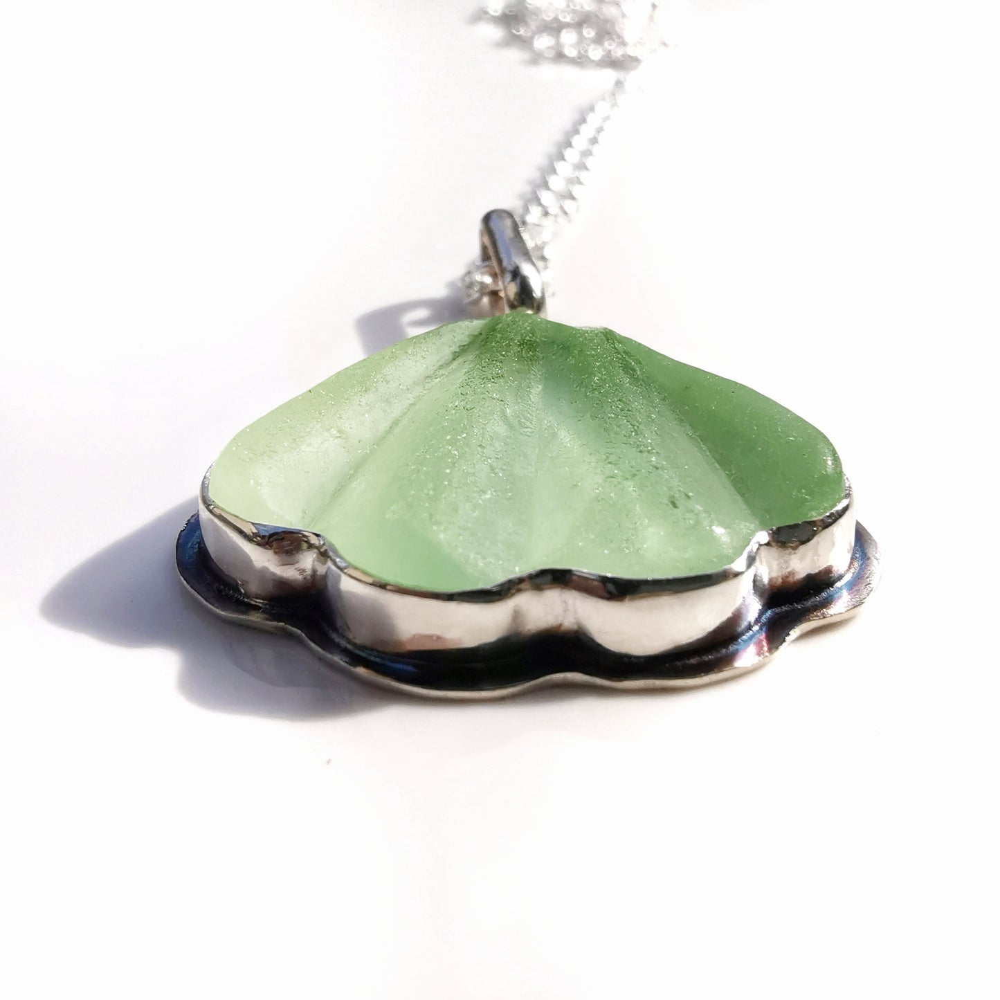 Scottish green sea glass shell & sterling silver pendant.
