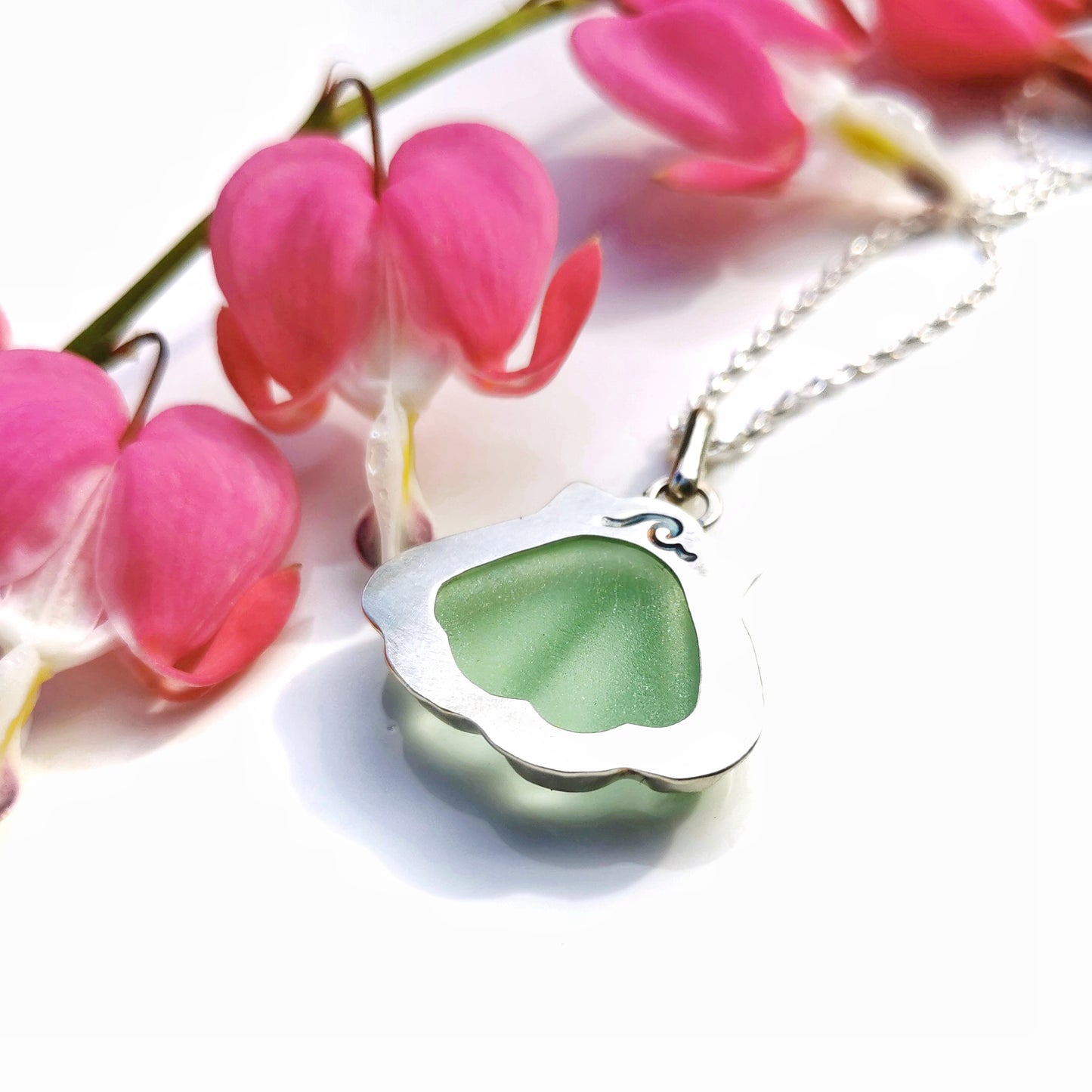 Scottish green sea glass shell & sterling silver pendant.