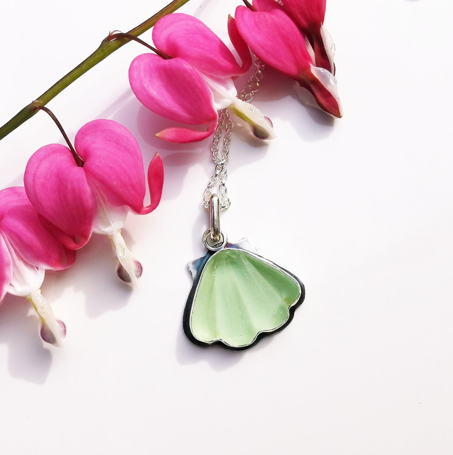 Scottish green sea glass shell & sterling silver pendant.