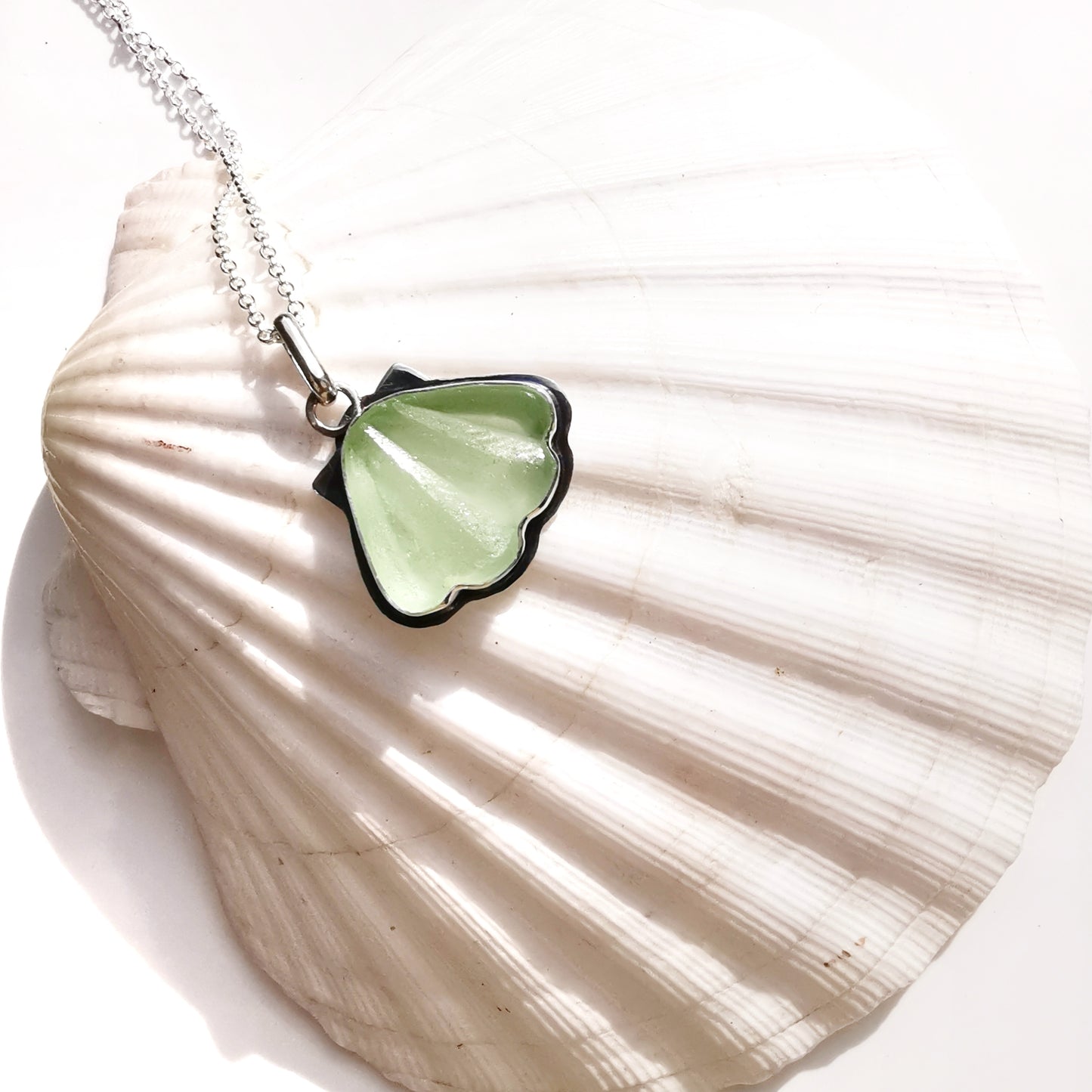 Scottish green sea glass shell & sterling silver pendant.
