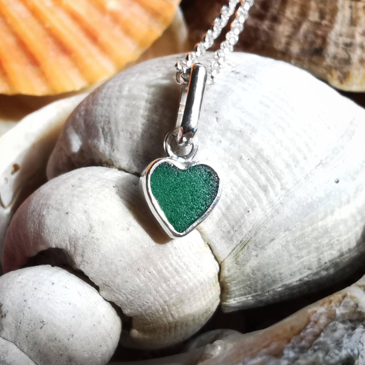 Tiny Scottish teal sea glass heart & sterling silver pendant.