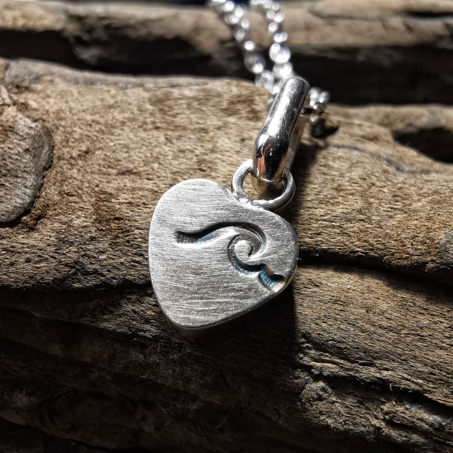 Tiny Scottish teal sea glass heart & sterling silver pendant.