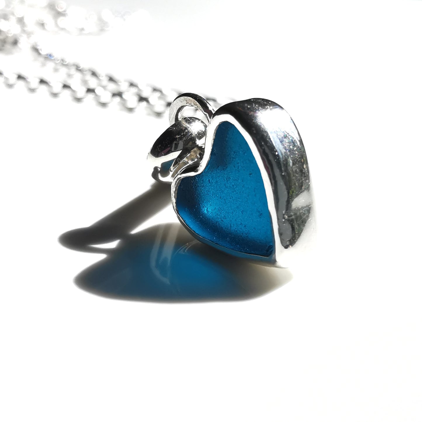 Tiny Scottish teal blue sea glass heart & sterling silver pendant.