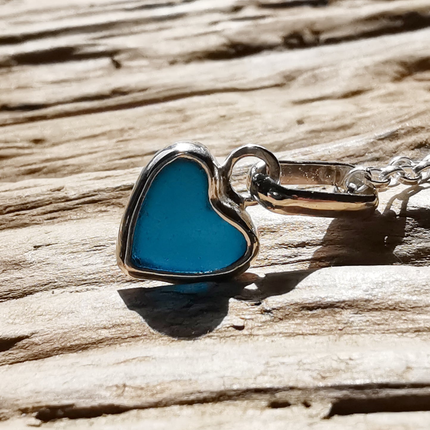 Tiny Scottish teal blue sea glass heart & sterling silver pendant.