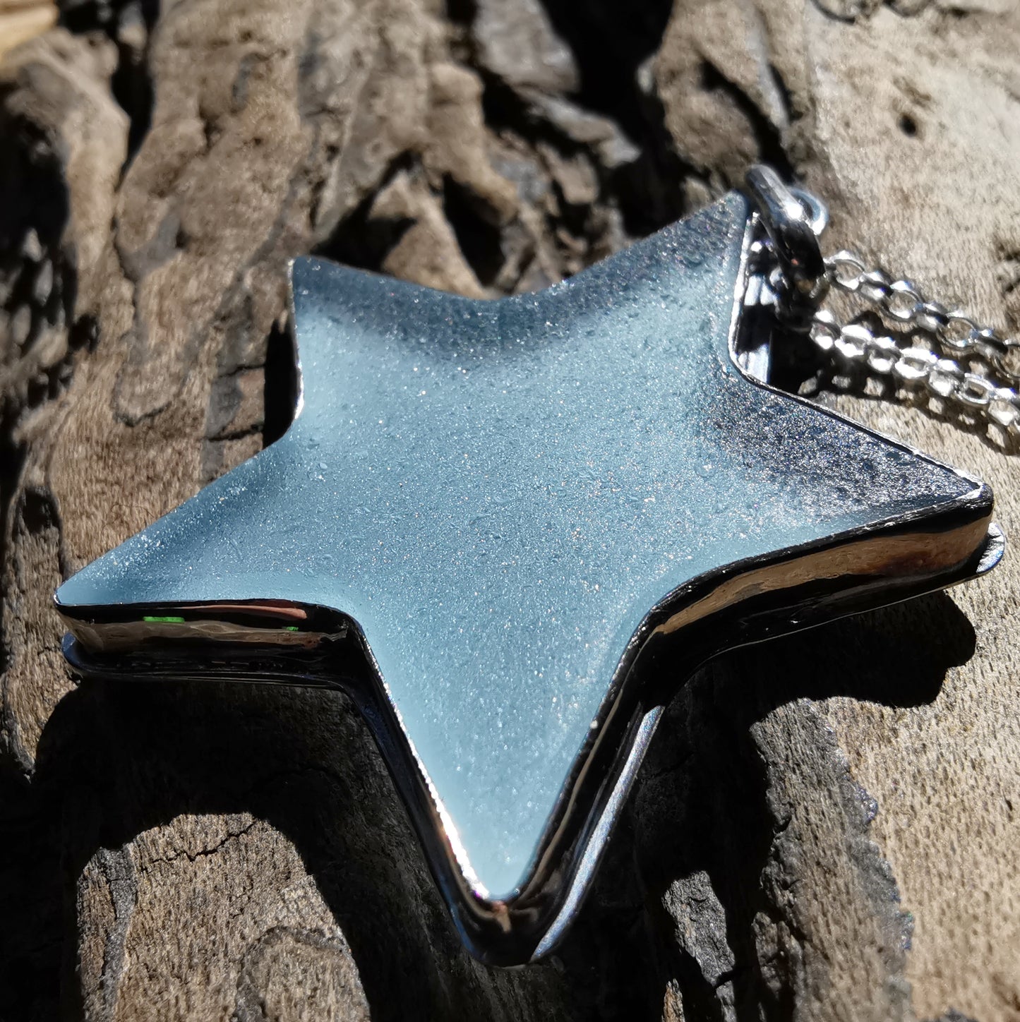 Scottish blue sea glass star & sterling silver pendant.