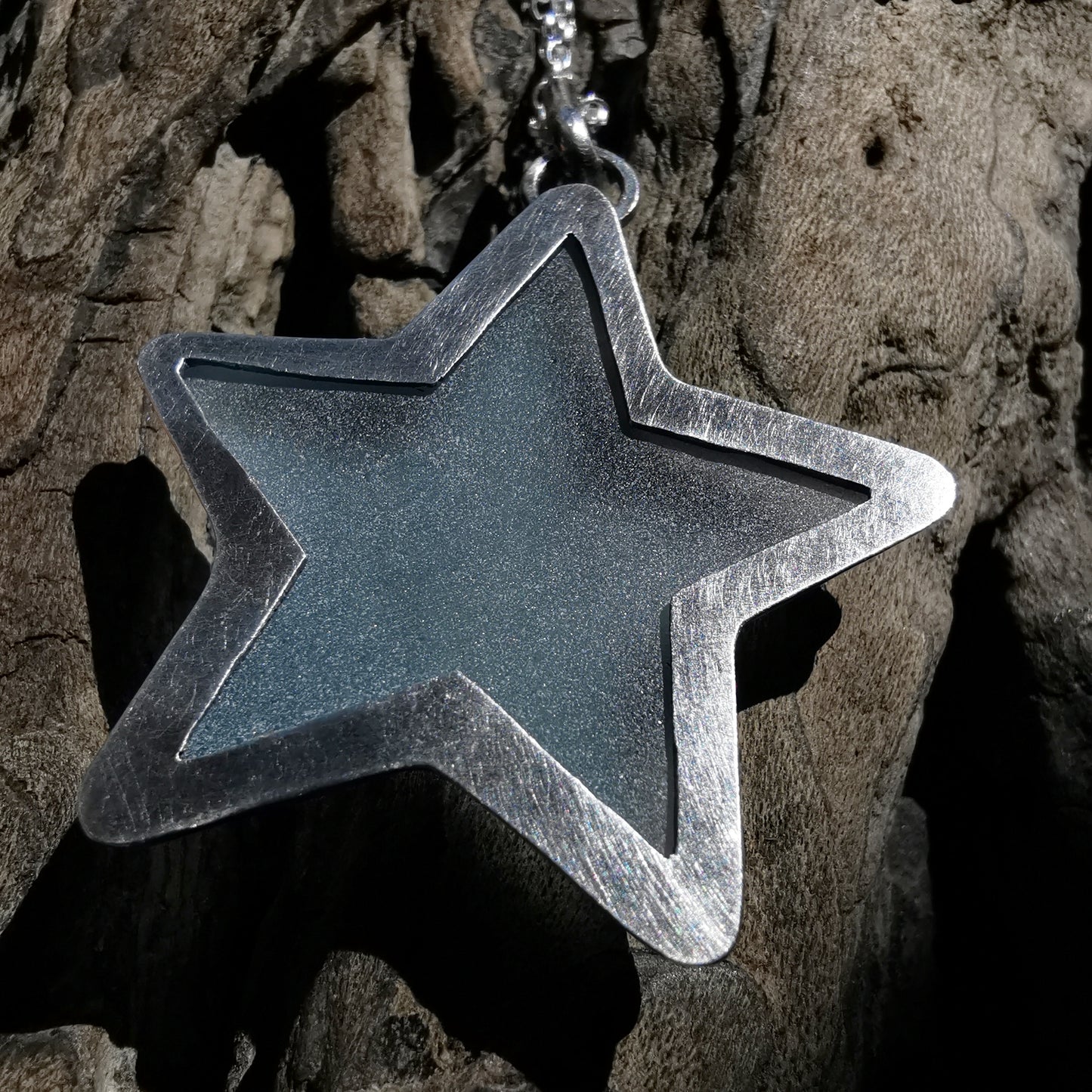 Scottish blue sea glass star & sterling silver pendant.